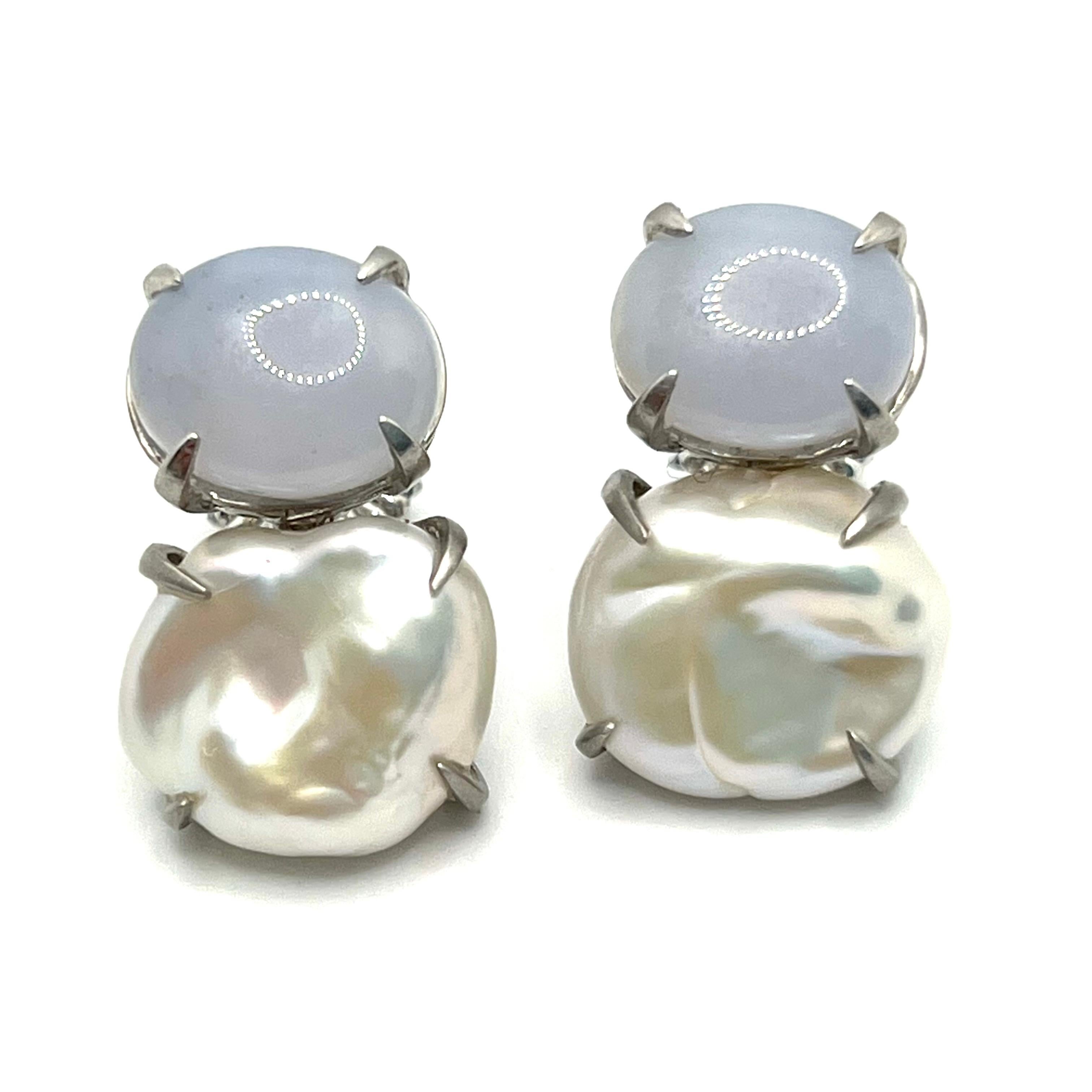 Bijoux Num Oval Cabochon Chalcedony and Keishi Pearl Earrings. 

The stunning pair of earrings feature beautiful genuine oval cabochon-cut chalcedony and lustrous cultured Japanese Keishi pearl, handset in platinum rhodium plated sterling silver