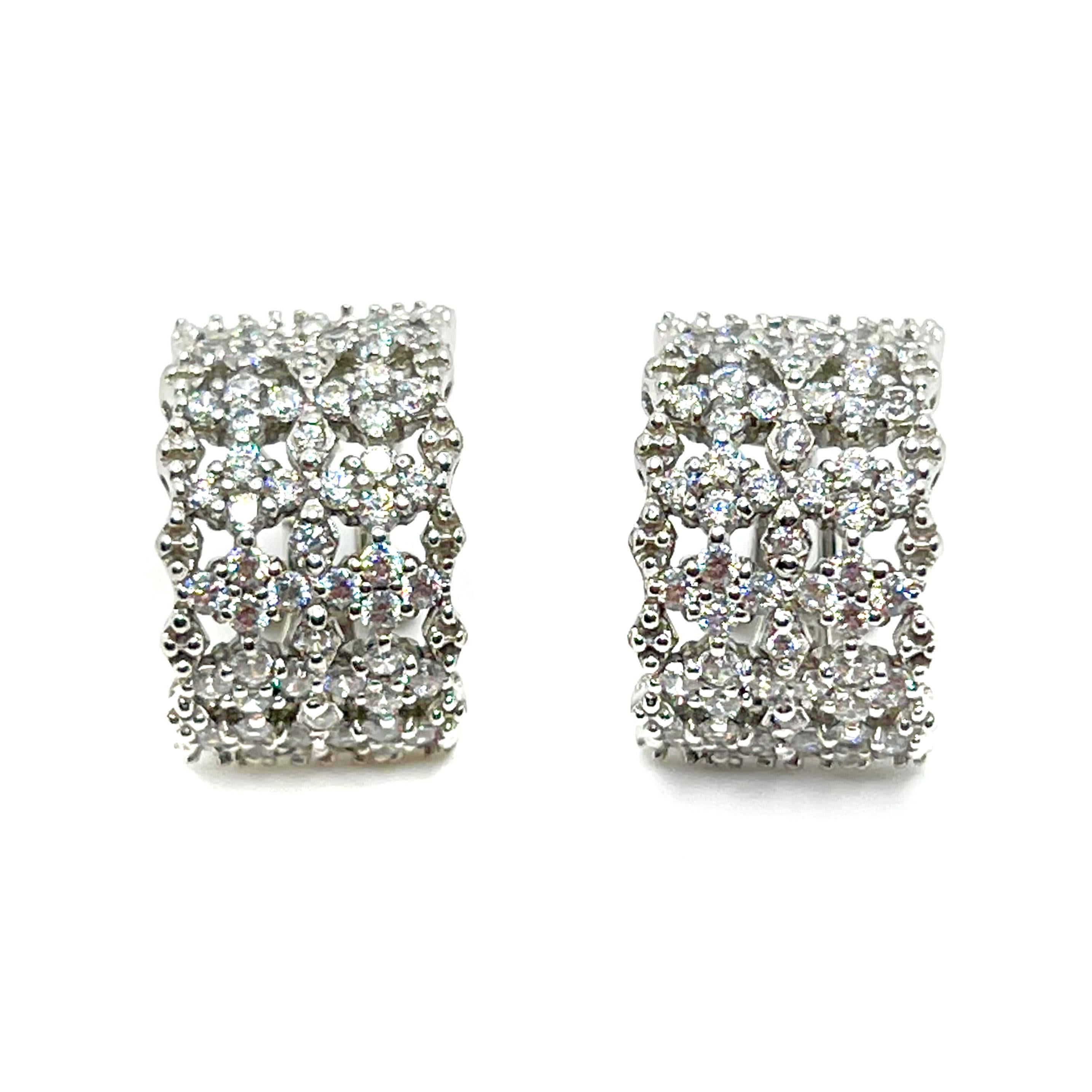 Stunning Bijoux Num Diamond-Pattern Half Hoop Sterling Silver Earrings

These fabulous earrings feature 108pcs of round simulated diamonds (AAA quality) handset in platinum rhodium plated sterling silver, small accent beads around the edge, and