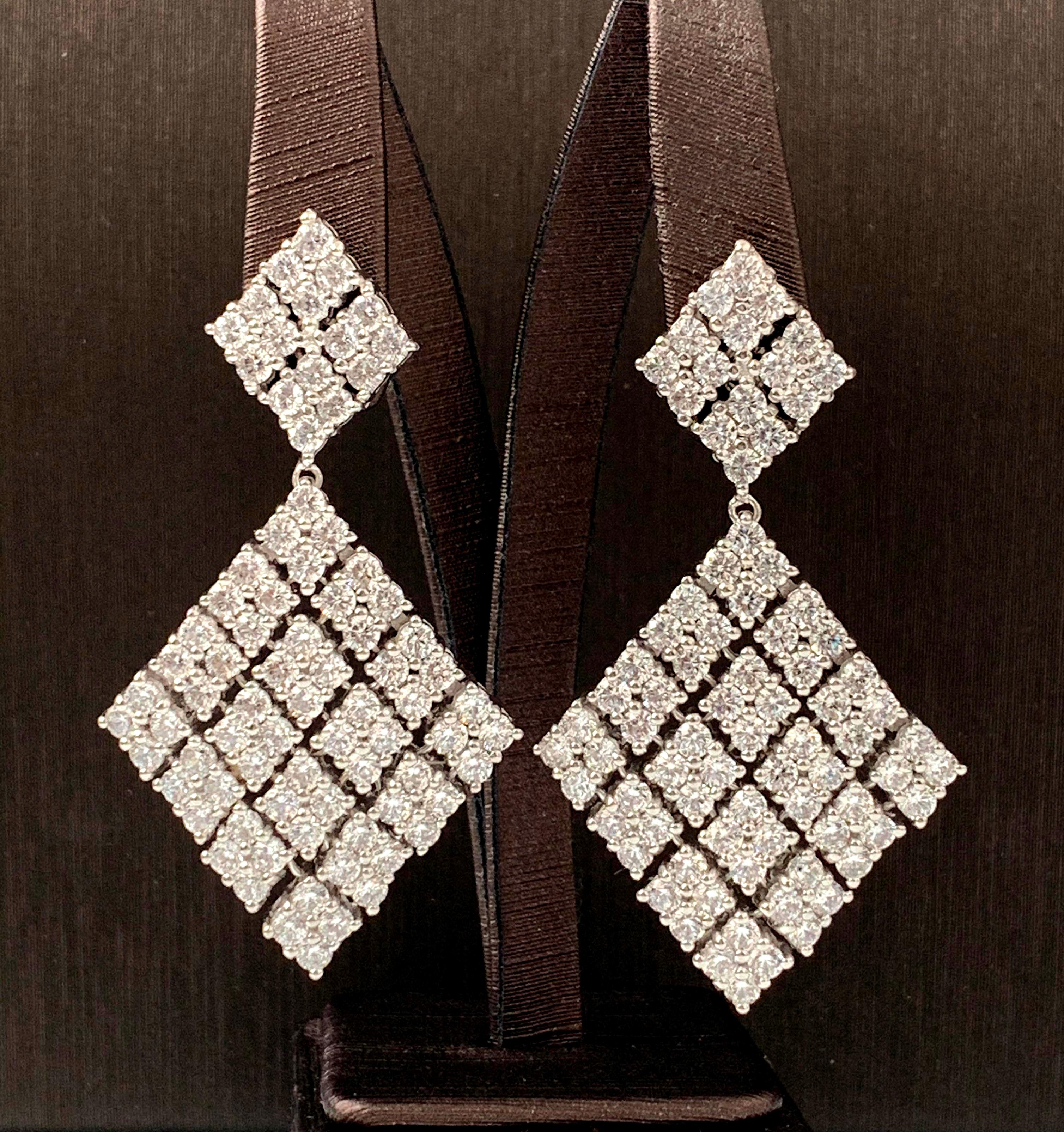 Stunning multilink diamond shape dangle cubic zirconia earrings.  Top part is 0.75