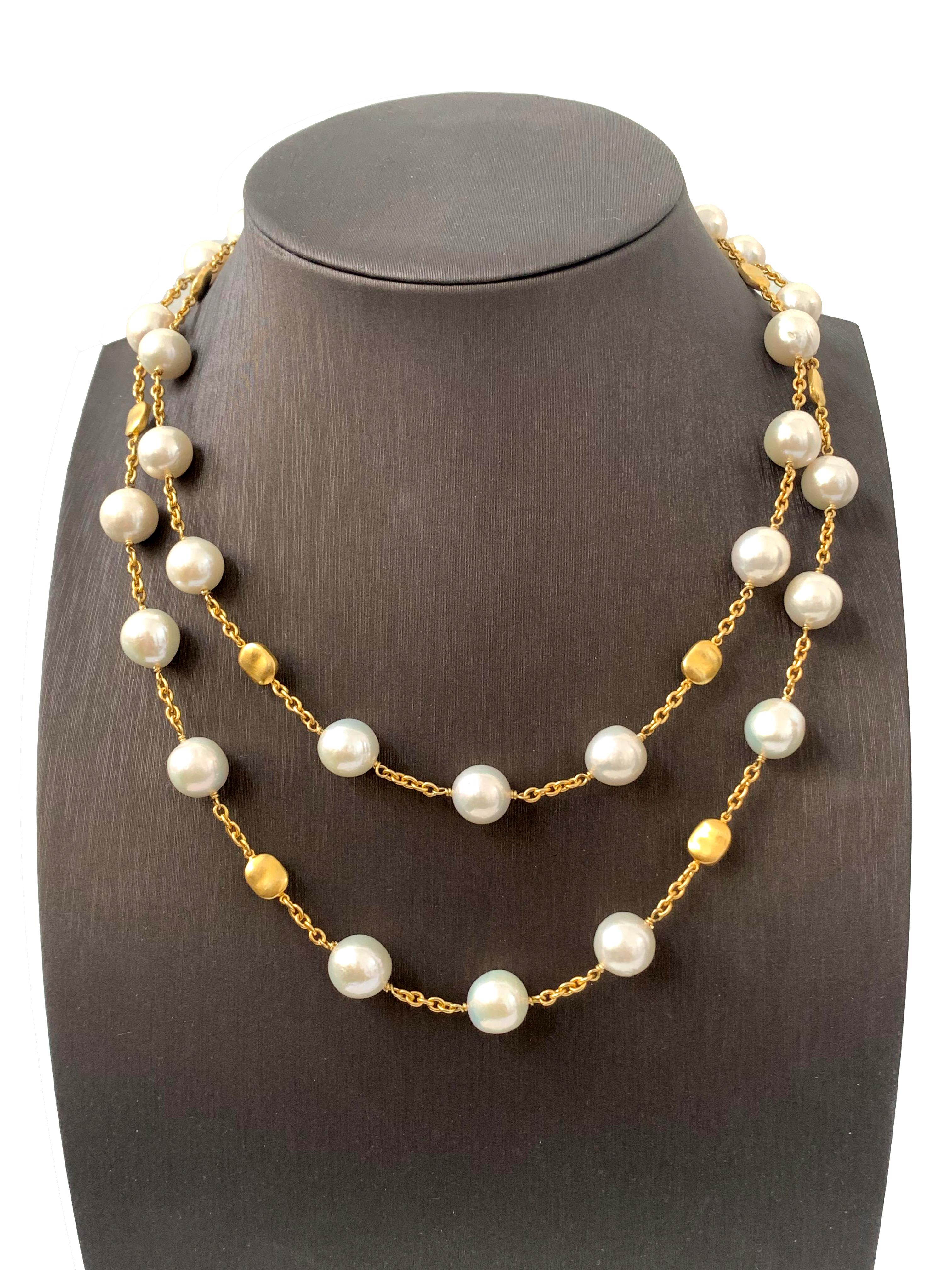 Contemporary Genuine Cultured Baroque Pearl Long Station Necklace

The necklace features 30 high-luster genuine cultured freshwater baroque pearls and 7 brushed-satin vermeil nuggets. The pearls measure approx. 12-13mm. Each station is hand wire
