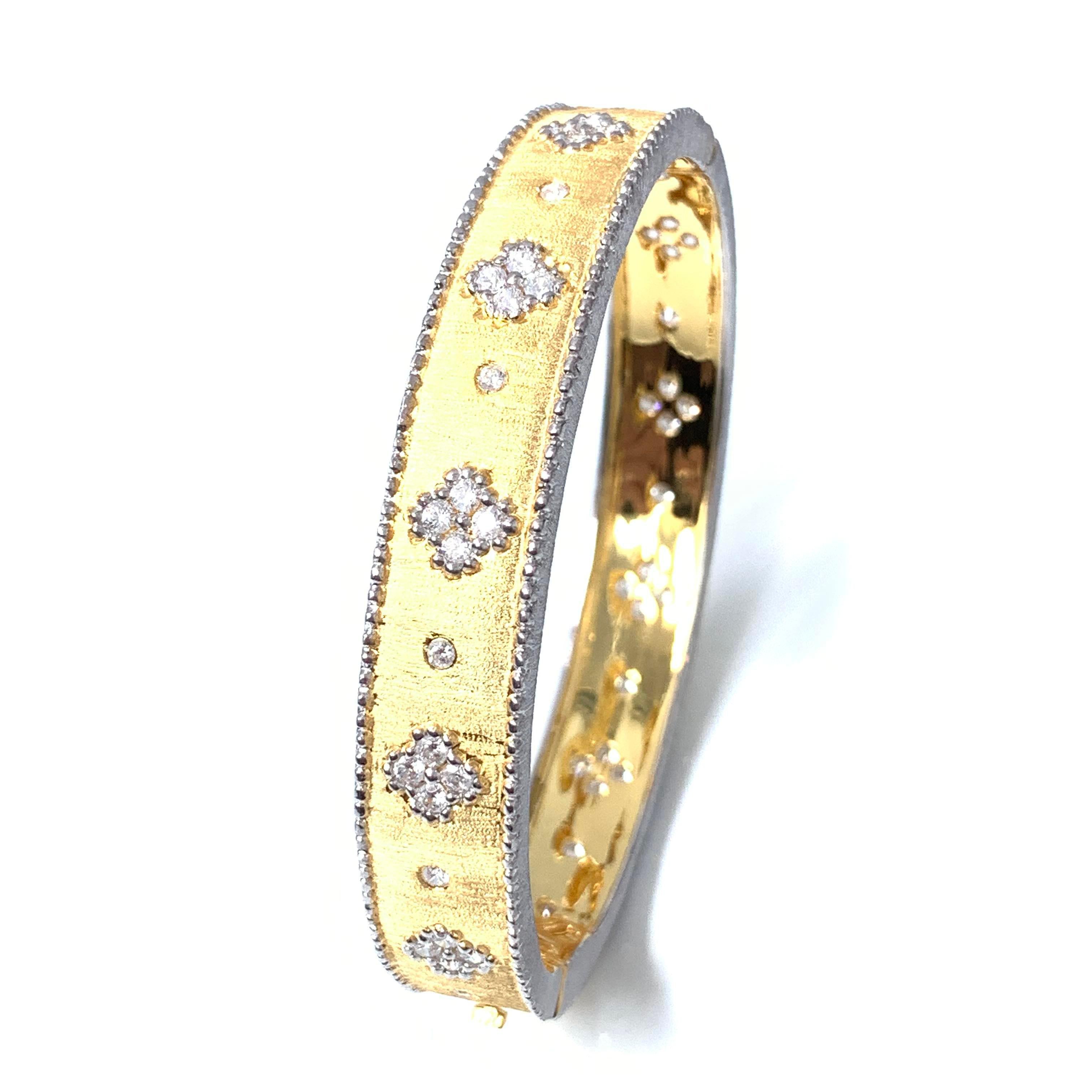 Bijoux Num hand-engraved star pattern vermeil bangle bracelet. 

This beautiful bracelet features over 50 pcs of round faux diamond cubic zirconia (CZ), handcrafted Italian 