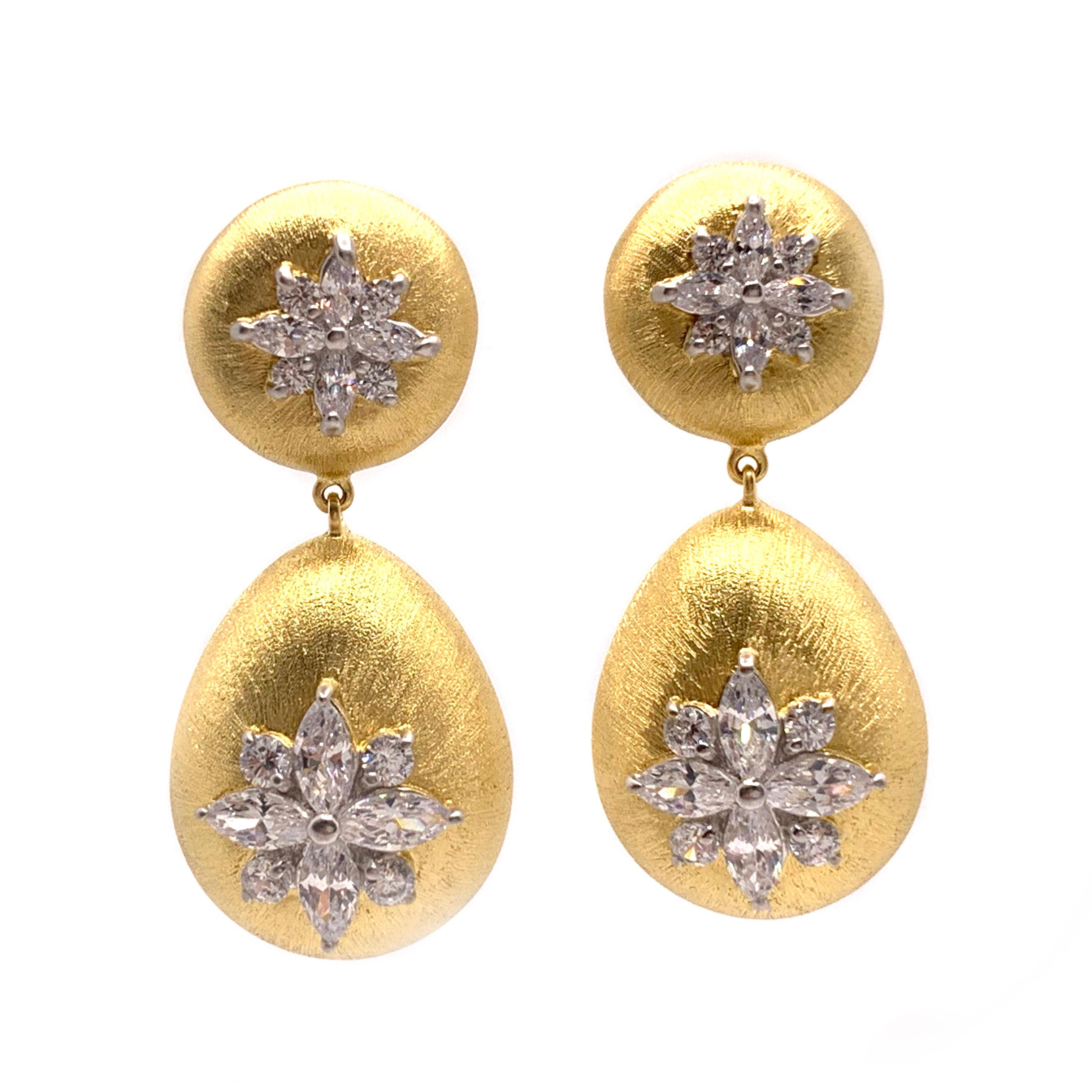 Stunning Bijoux Num's Hand-engraved Marquis Flower Vermeil Drop Earrings.

These beautiful earrings features marquis and round simulated diamonds handset in 18k yellow gold vermeil over sterling silver. The setting was engraved throughout by hand