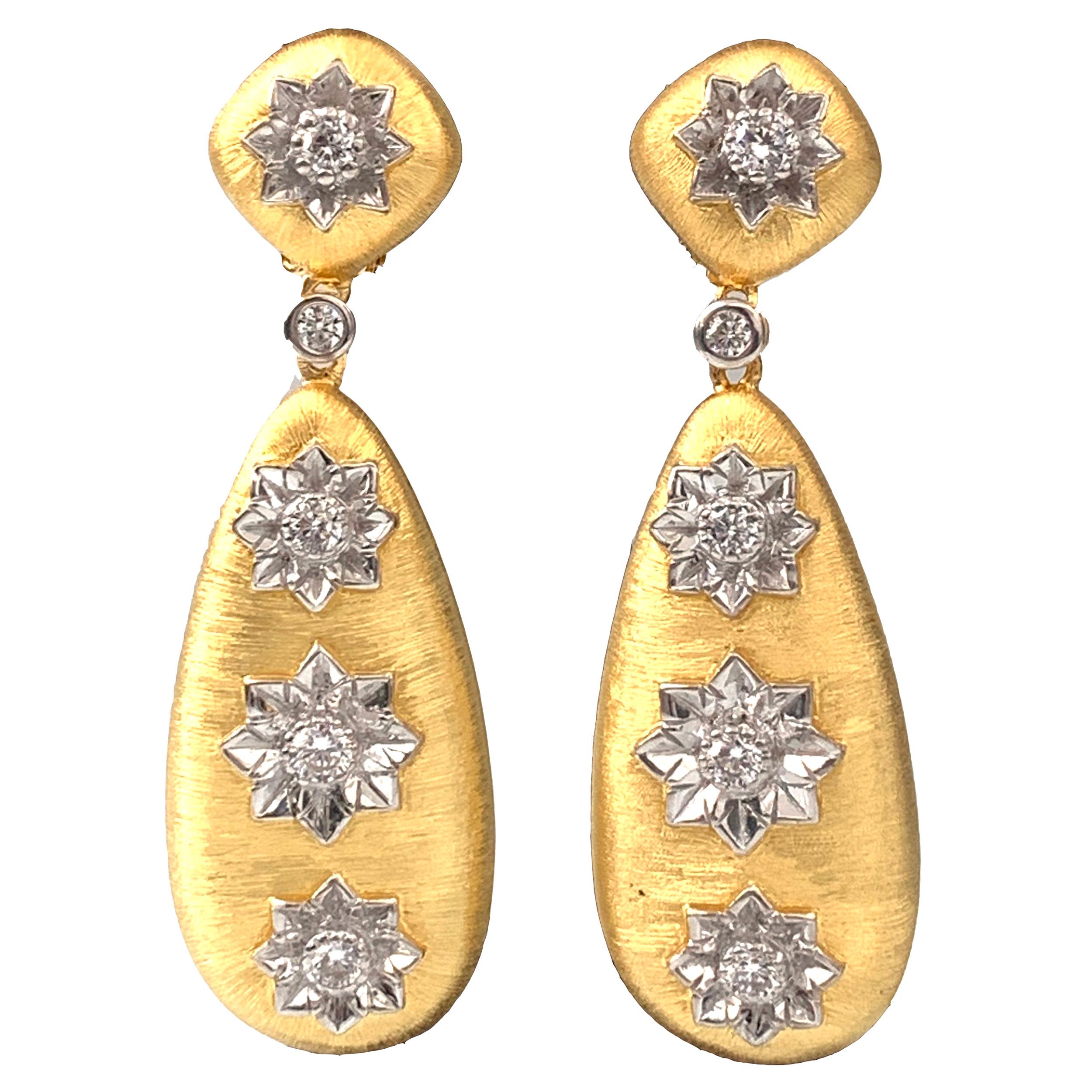 Stunning hand-engraved large teardrop earrings encrusted with round simulated diamonds. The rigato engraving texture are all done by hand creating a beautiful unique look. Top part has diameter of 0.5