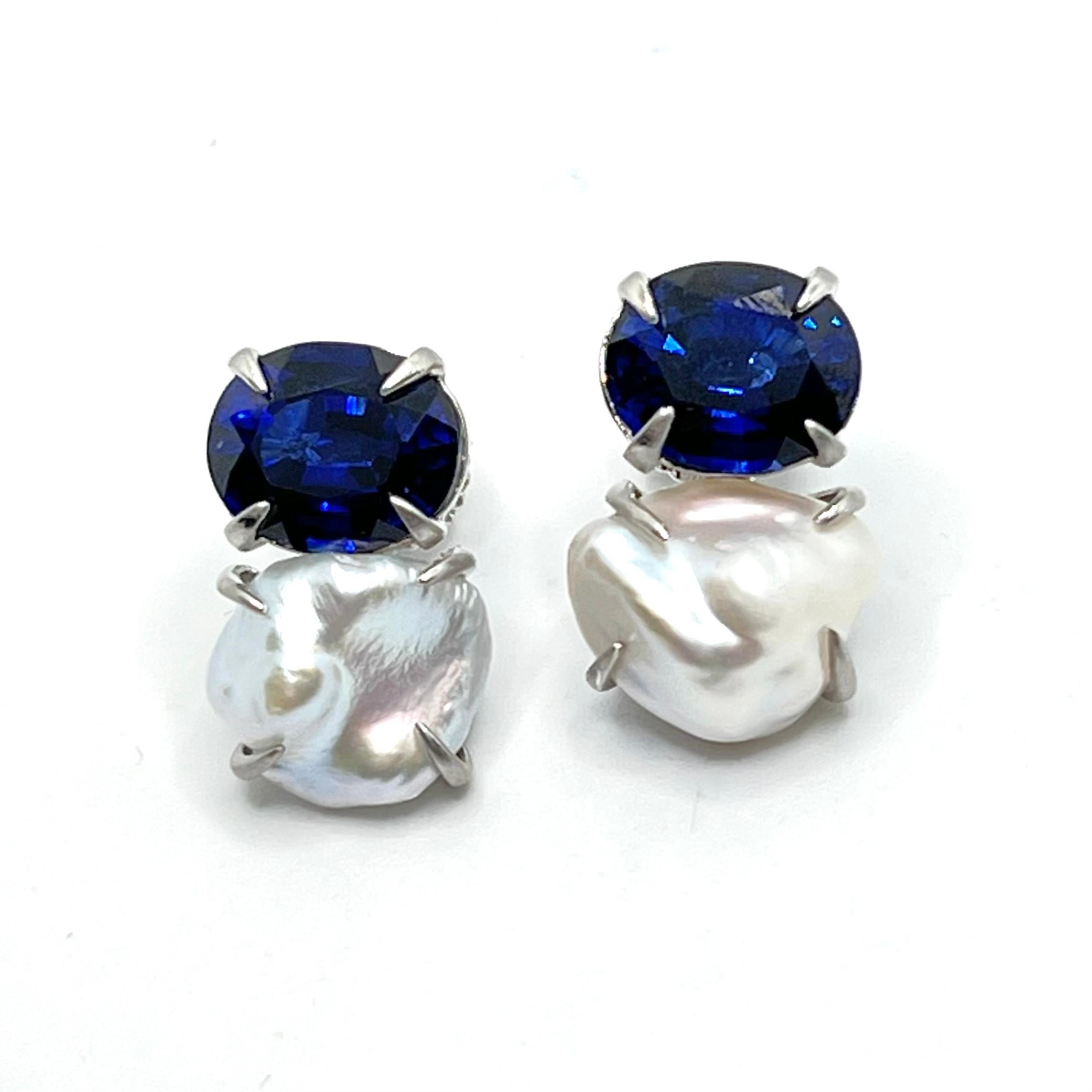 Bijoux Num Oval Blue Sapphire and Keishi Pearl Earrings. 

The stunning pair of earrings feature beautiful lab-created blue sapphire and lustrous cultured Japanese Keishi pearl, handset in platinum rhodium plated sterling silver and brush satin