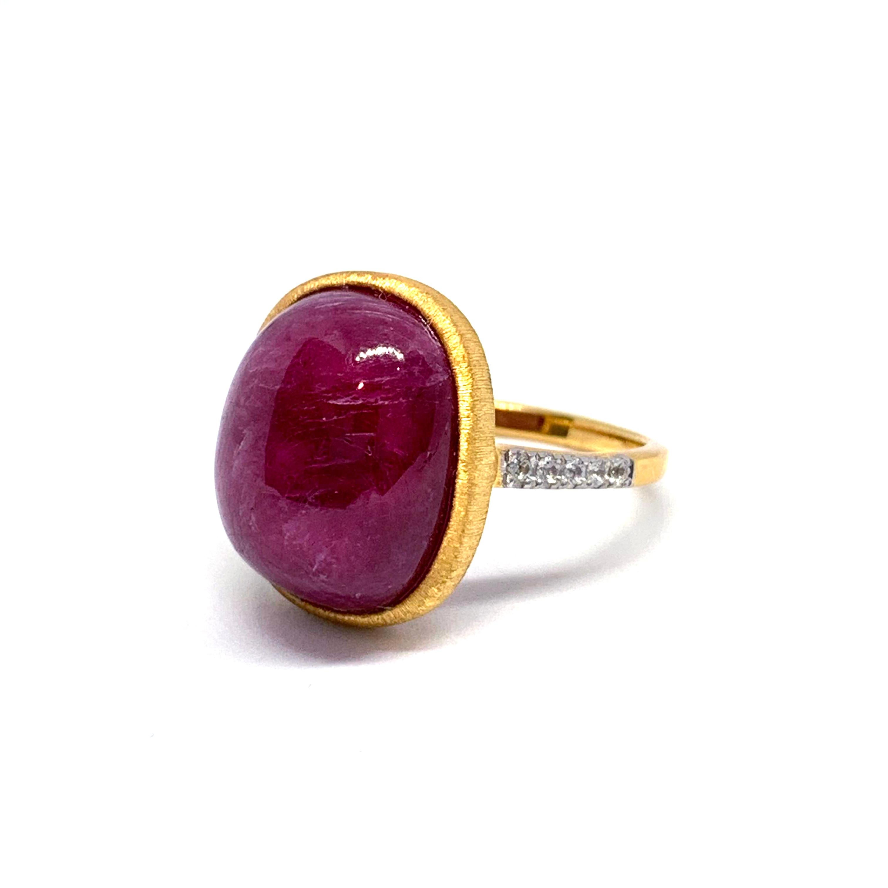 Stunning Bijoux Num Genuine Oval Ruby Vermeil Earrings. 
This ring features a beautiful 23.5ct pink-ish oval cabochon-cut Mozambique ruby, adorned with genuine round white topaz, handset in 18k gold vermeil over sterling silver, and finished with