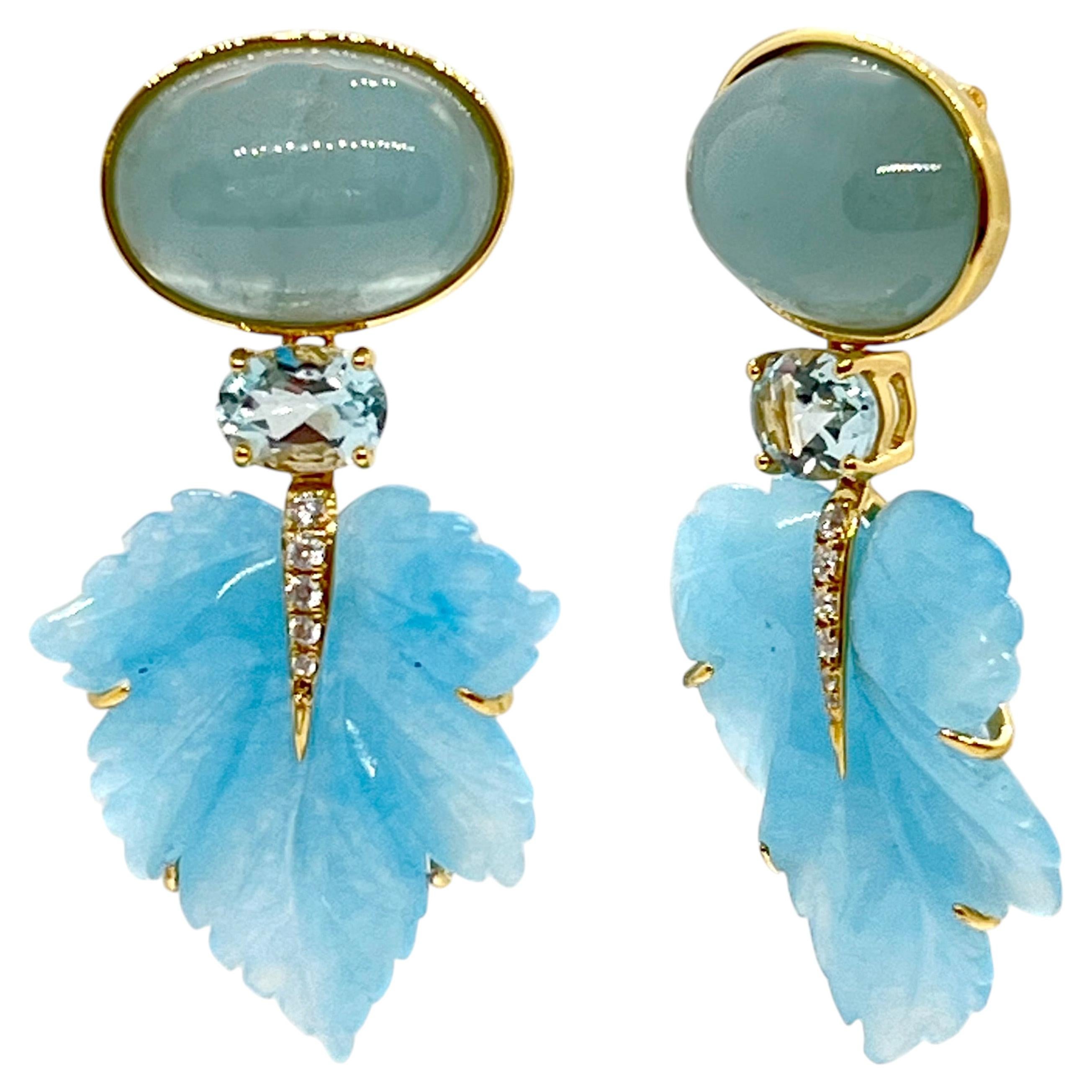 Bijoux Num: Impresionantes pendientes con aguamarina en cabujón y hoja de cuarcita azul tallada