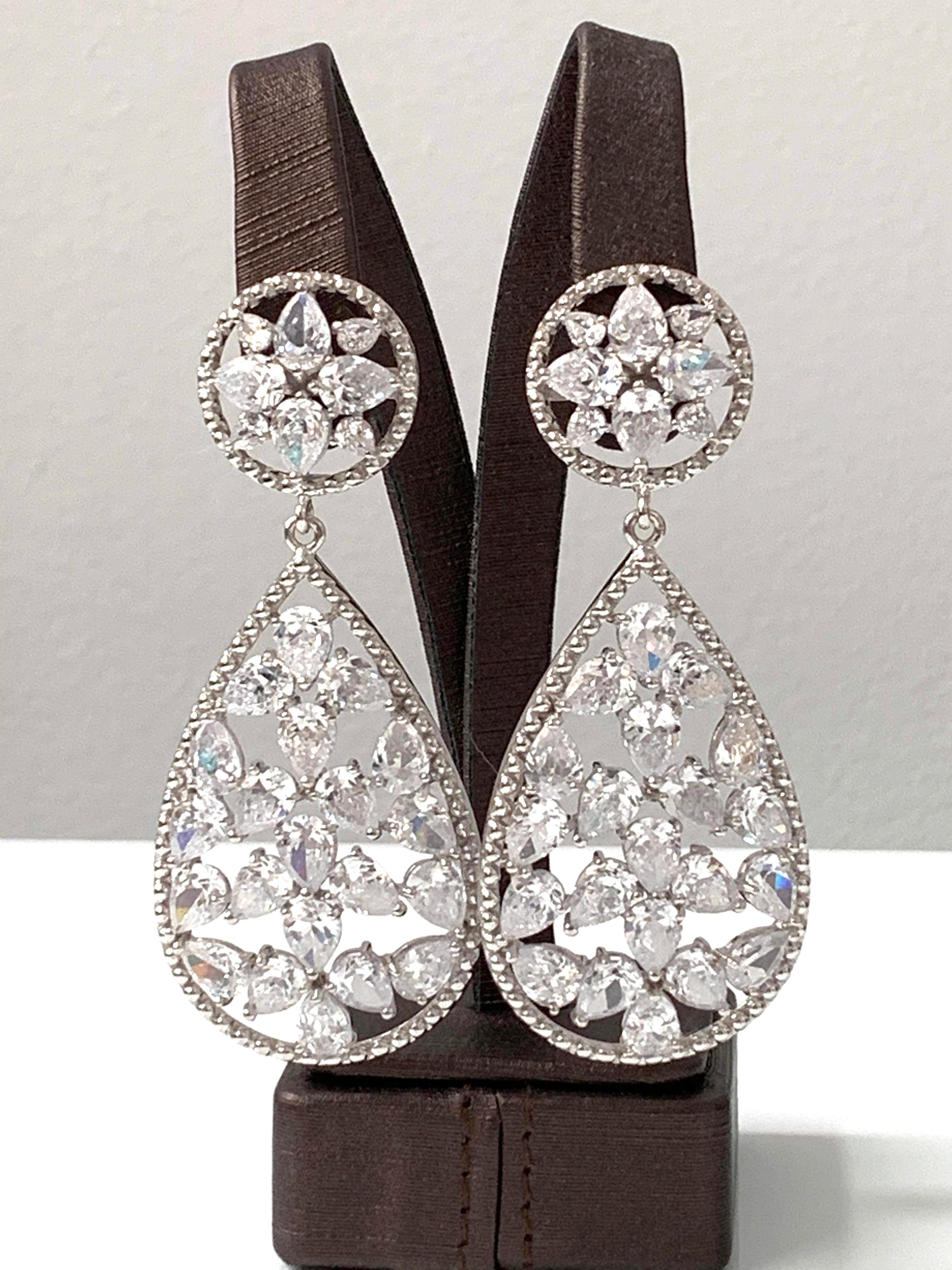 Stunning Pear Shape Drop Cubic Zirconia Earrings. AAA quality CZ showing a lot of fire!  Top part is 0.75