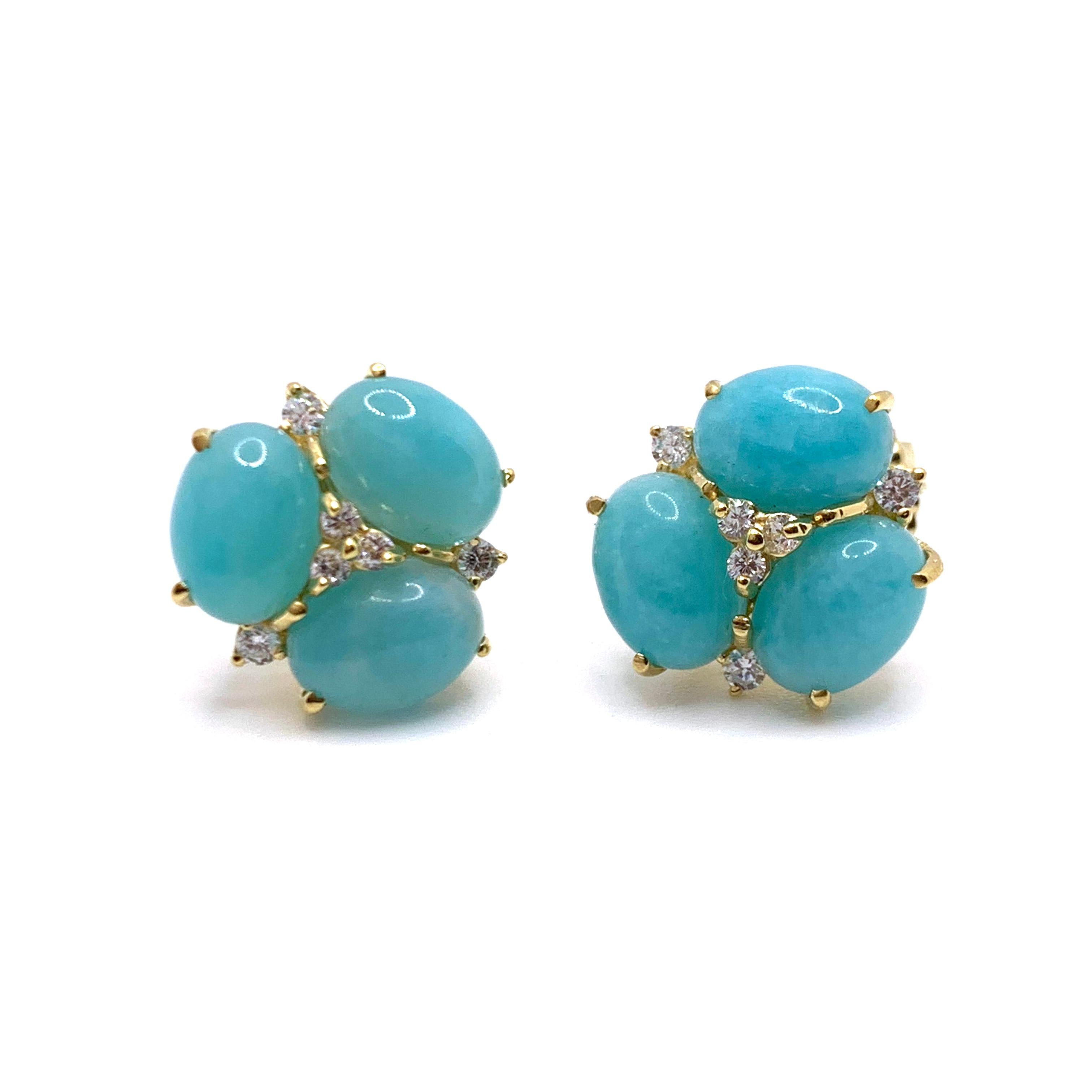 These stunning pair of earrings feature sets of oval cabochon-cut amazonite adorned with round simulated diamonds, handset in 18k yellow gold vermeil over sterling silver. The amazonite offer rich blue-green hue with unique beautiful color almost