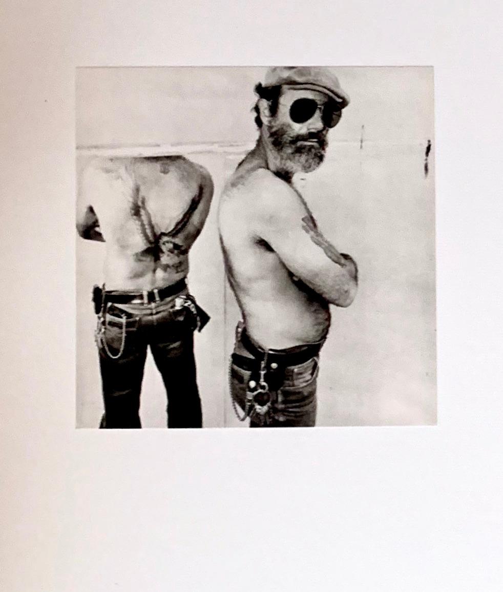 Biker in a mirror black and white photograph Gravure print by Burk Uzzle 1980 
 Gravure print (1984, France). 

Burk Uzzle is an American photojournalist, previously member of Magnum Photos and president of Magnum from 1979-1980. 

The