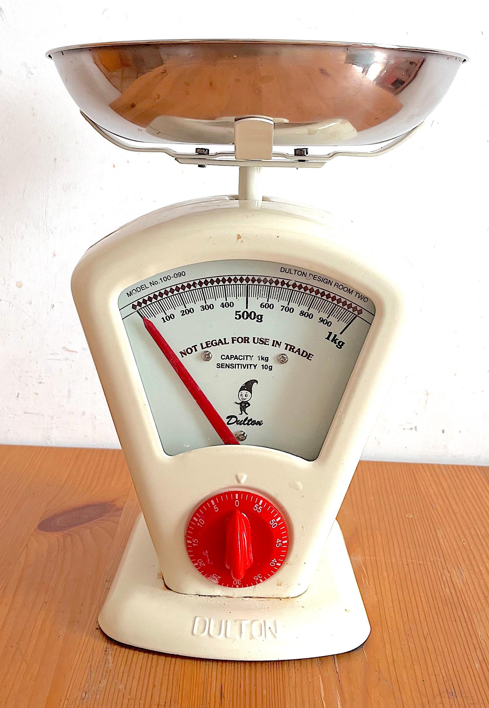 Simple but elegant design by Yasu Sasamoto for Dulton. A kitchen scale with a built-in timer. Tested and working (both timer and accuracy are good). This creamy white edition will be the focus of every kitchen. The rear has a wheel that can be