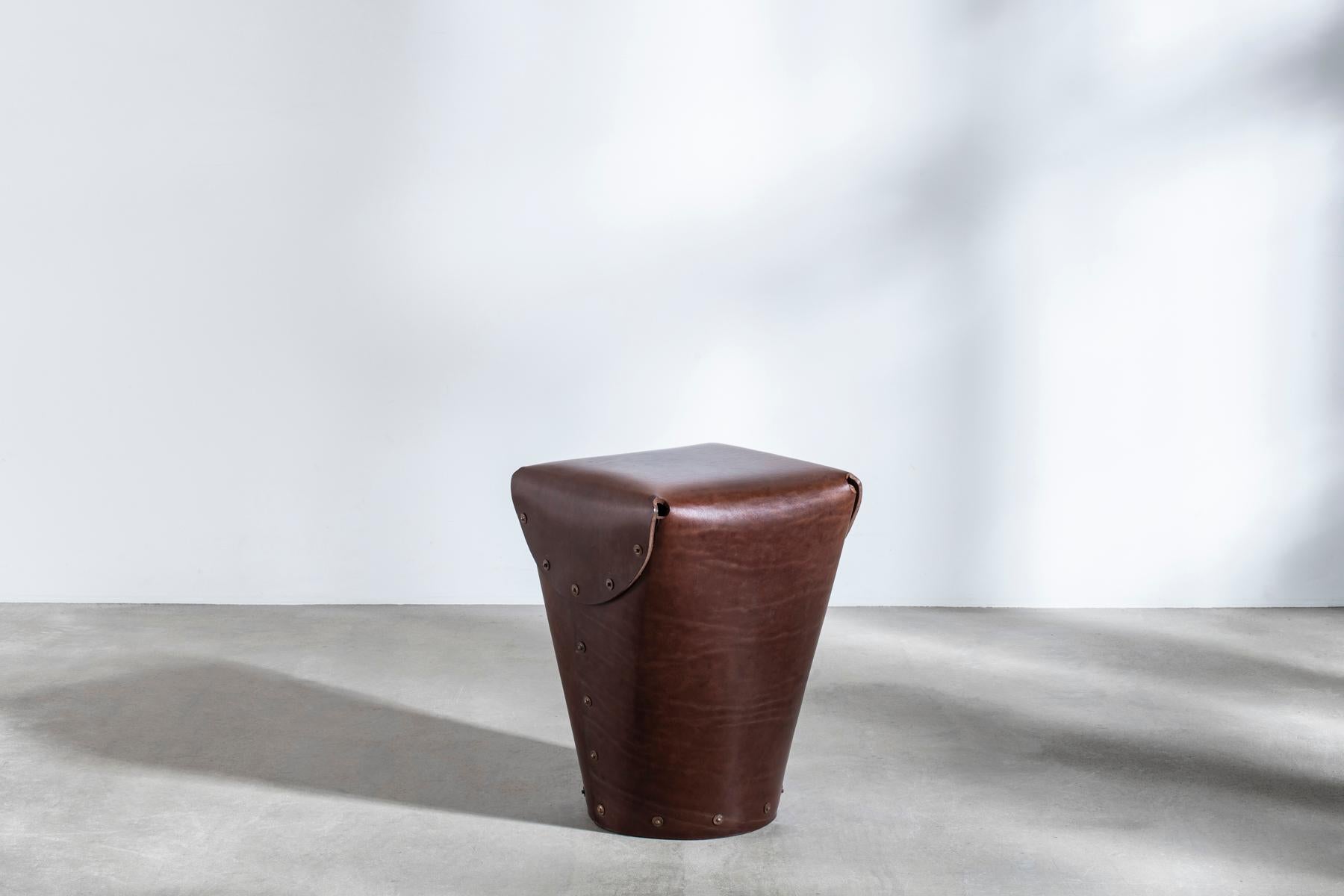 Introduced at London Design Festival 2017, the second iteration of the Bill Amberg Rivet Stool is presented in dark brown bridle leather.

Handmade at the Bill Amberg workshops in London, the stool is made of a single, beautiful piece of 6mm