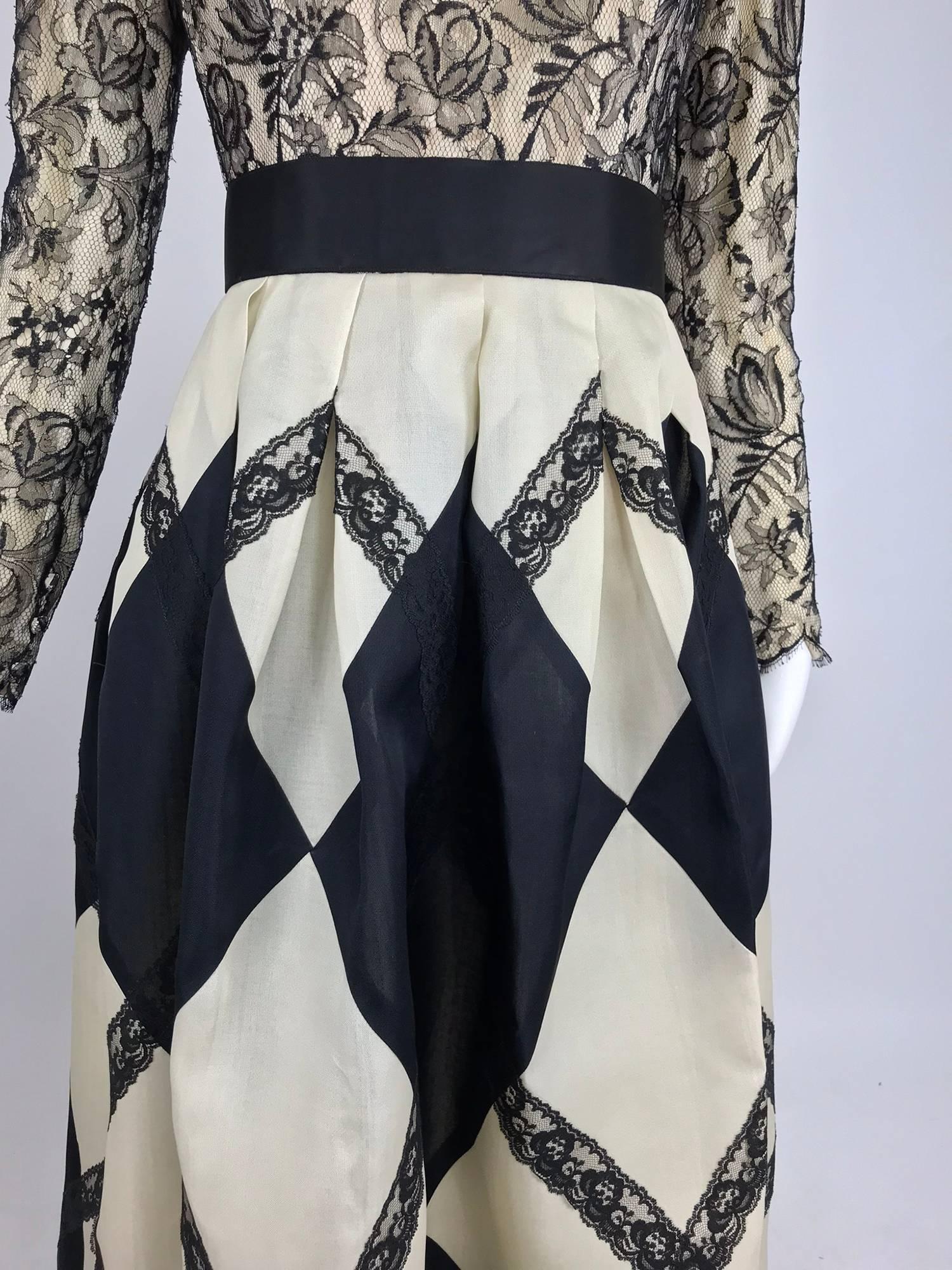 Elegant black and off white harlequin gown from Bill Blass, if only Truman was planning another soiree, this would certainly be worthy...Chantilly lace fitted bodice with long sleeves with a full silk organza skirt that is appliqued with diagonal