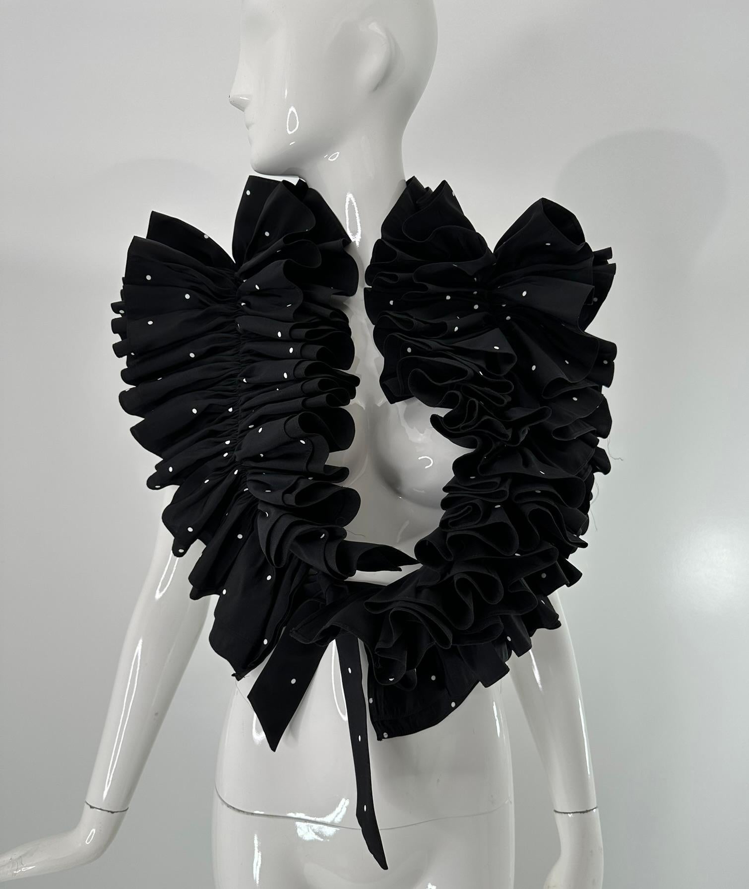 Bill Blass black 
white faille mini polka dot, ruffle evening stole 1990s. Ruffle pleated stole ties to close. The perfect accessory to add an original touch to any outfit. In very good pre-owned condition. Double layer ruffles.