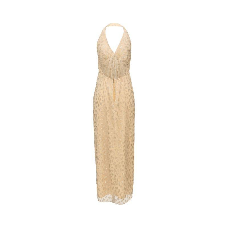 Deep cream colored Bill Blass 1970’s chiffon gown with shimmering geometric spotted pattern throughout. Halter neckline with flowing chiffon paneling flatters the chest and creates beautiful movement.

Additional information:
Best fits size US 0 -