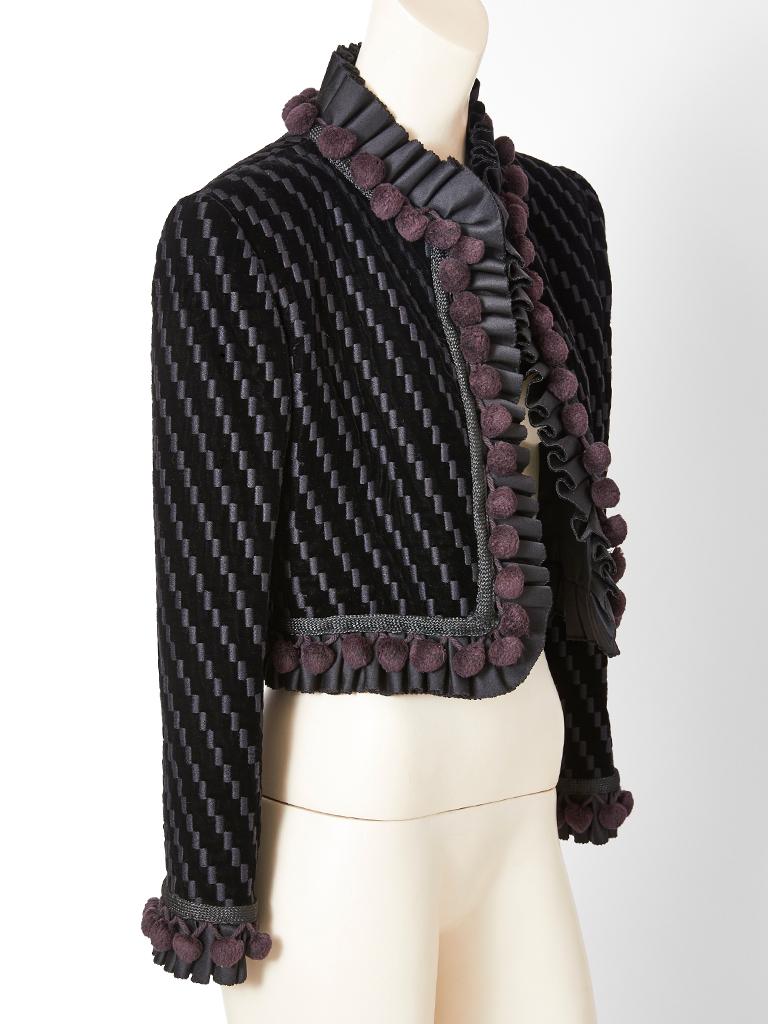 Bill Blass, velvet embroidered, cropped jacket, having ruffled and pom pom detail edging along cuffs, hem, neck and center front. 