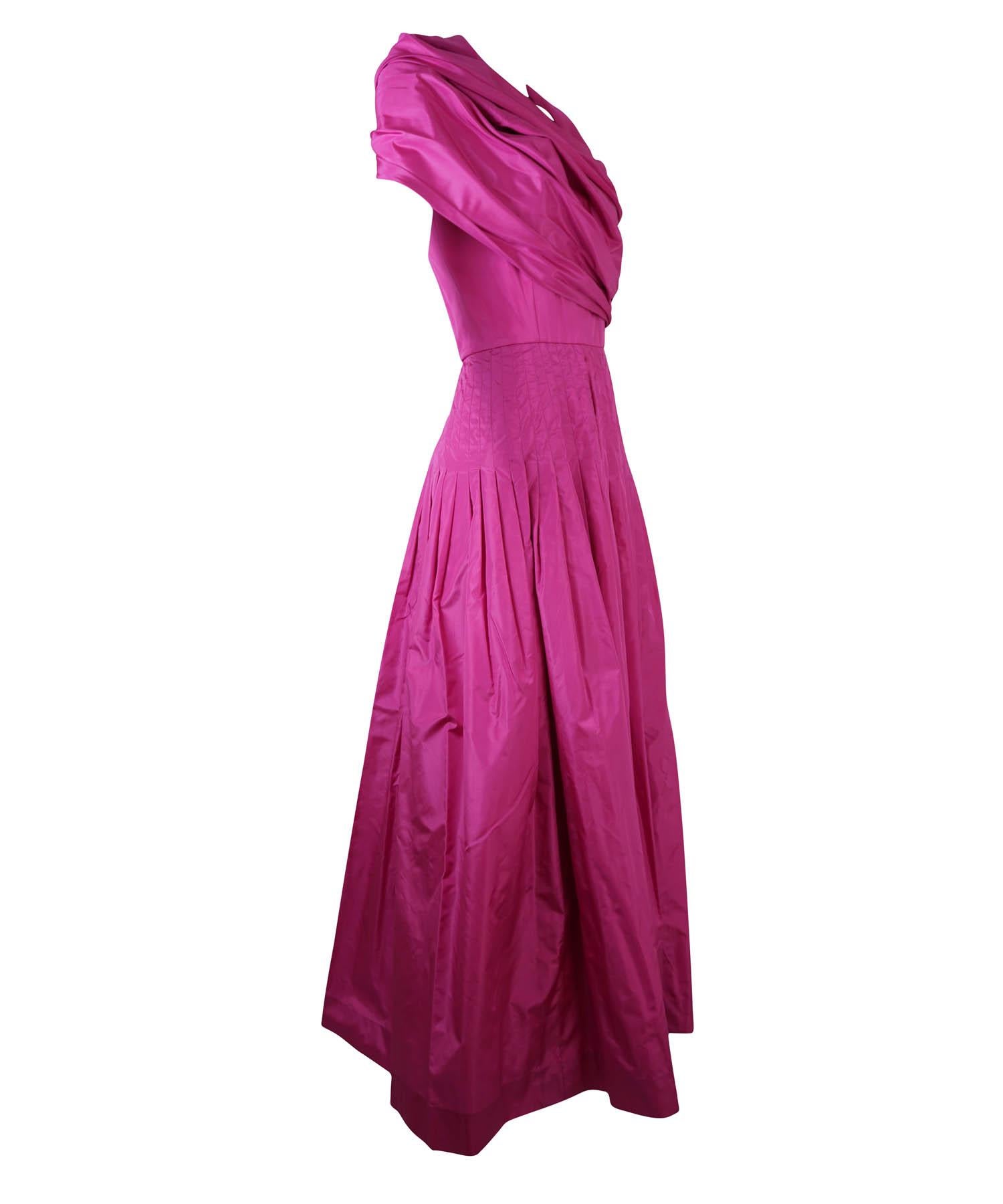 Bill Blass Hot Pink Silk taffeta strapless gown with attached shawl. Vintage from the 1980s. Features back zipper, pleated waist, full skirt and structured strapless bodice with a wrapping shawl that hooks to the front. Self fabric belt ties in bow