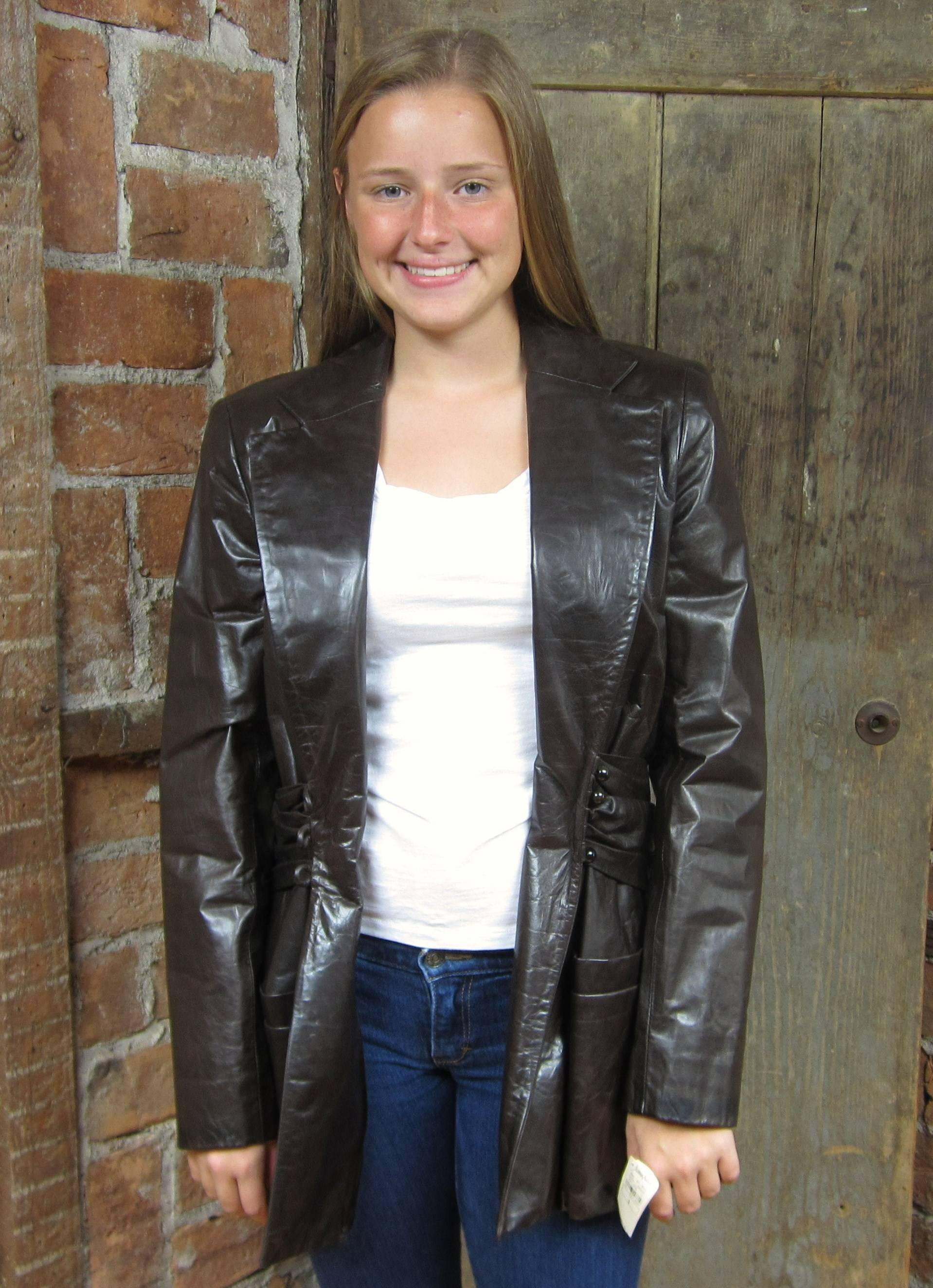 Great Dark Brown Bill Blass Leather Jacket. Pleated Faux Belt with a 3-button closure. Nice size lapel. Great versatile Jacket - Purchased and stored away and never worn. Measures up to 36 chest-- up to 28 waist -- 30 inches long -- 25 inches