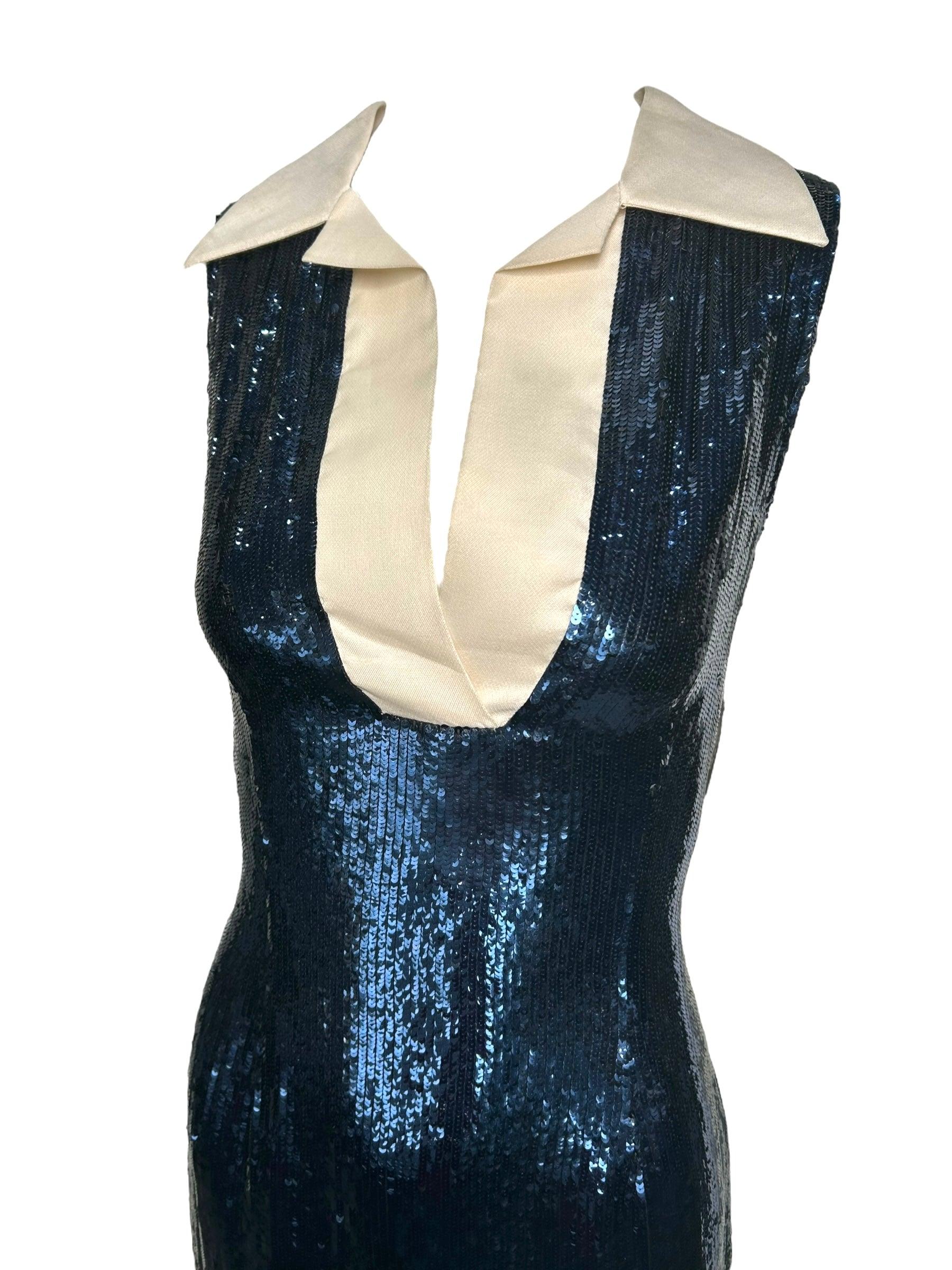 Truly incredible flirty little Bill Blass cocktail dress. Seemingly one of a kind and so flirty! We love a '80s does '40s moment. You can't get much better than a navy sequin matched with a sailor collar. Shimmery mermaid scale sequins lean into the
