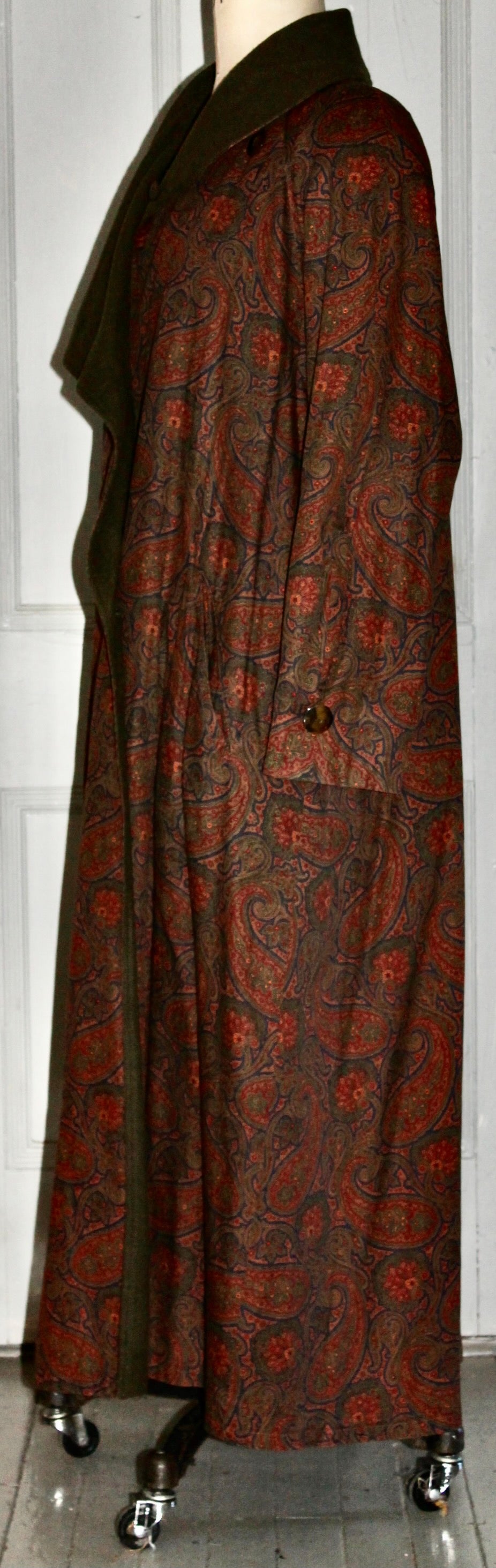 Offering a Bill Blass Paisley patterned coat of Edwardian inspiration.  Coat is cotton, with a flannel wool lining.  Fully lined. And labeled- Made in Japan.