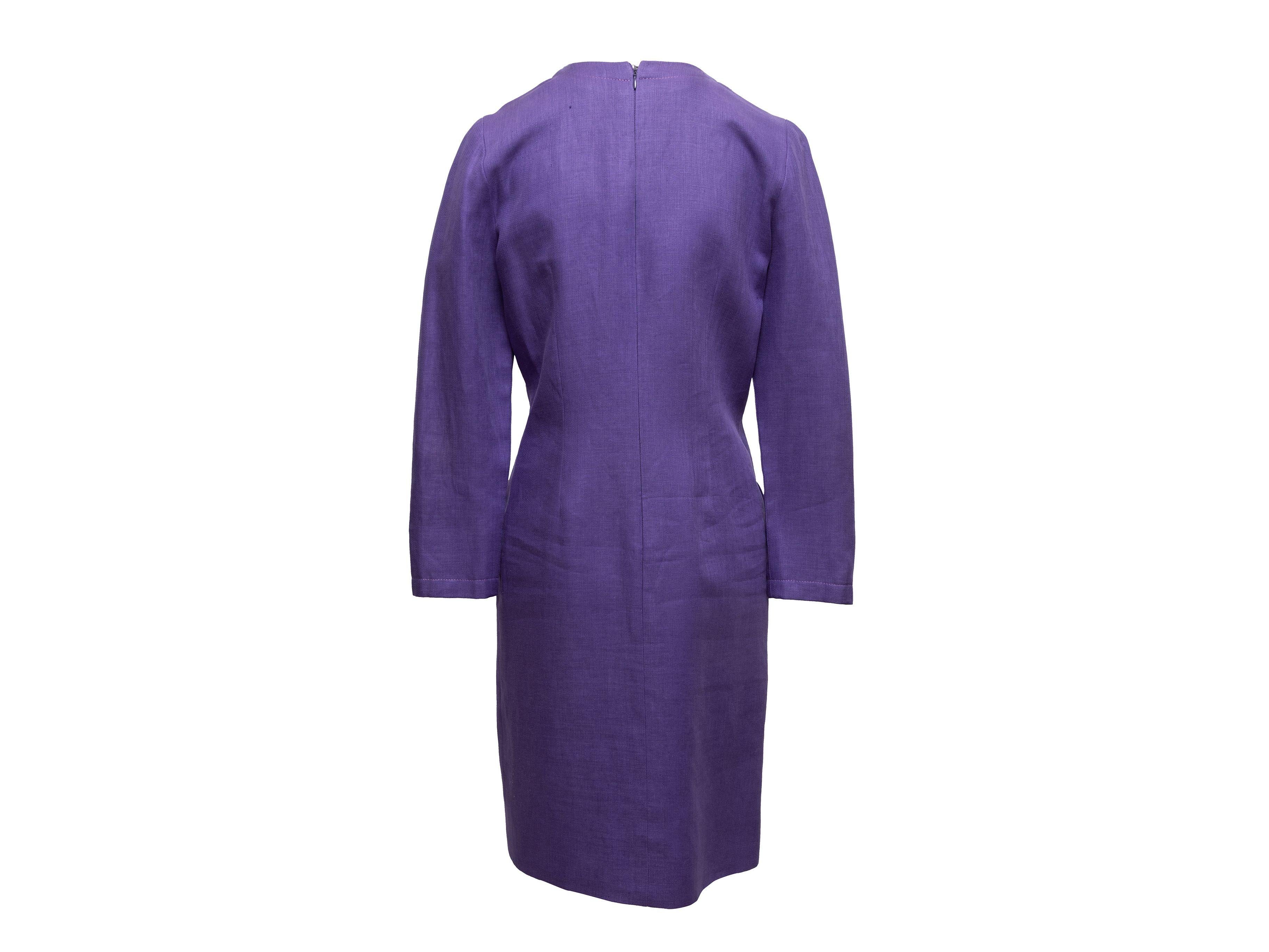 Product Details: Vintage purple linen long sleeve dress by Bill Blass. Gold-tone hardware. Crew neck. Button at front. Zip closure at center back. 34