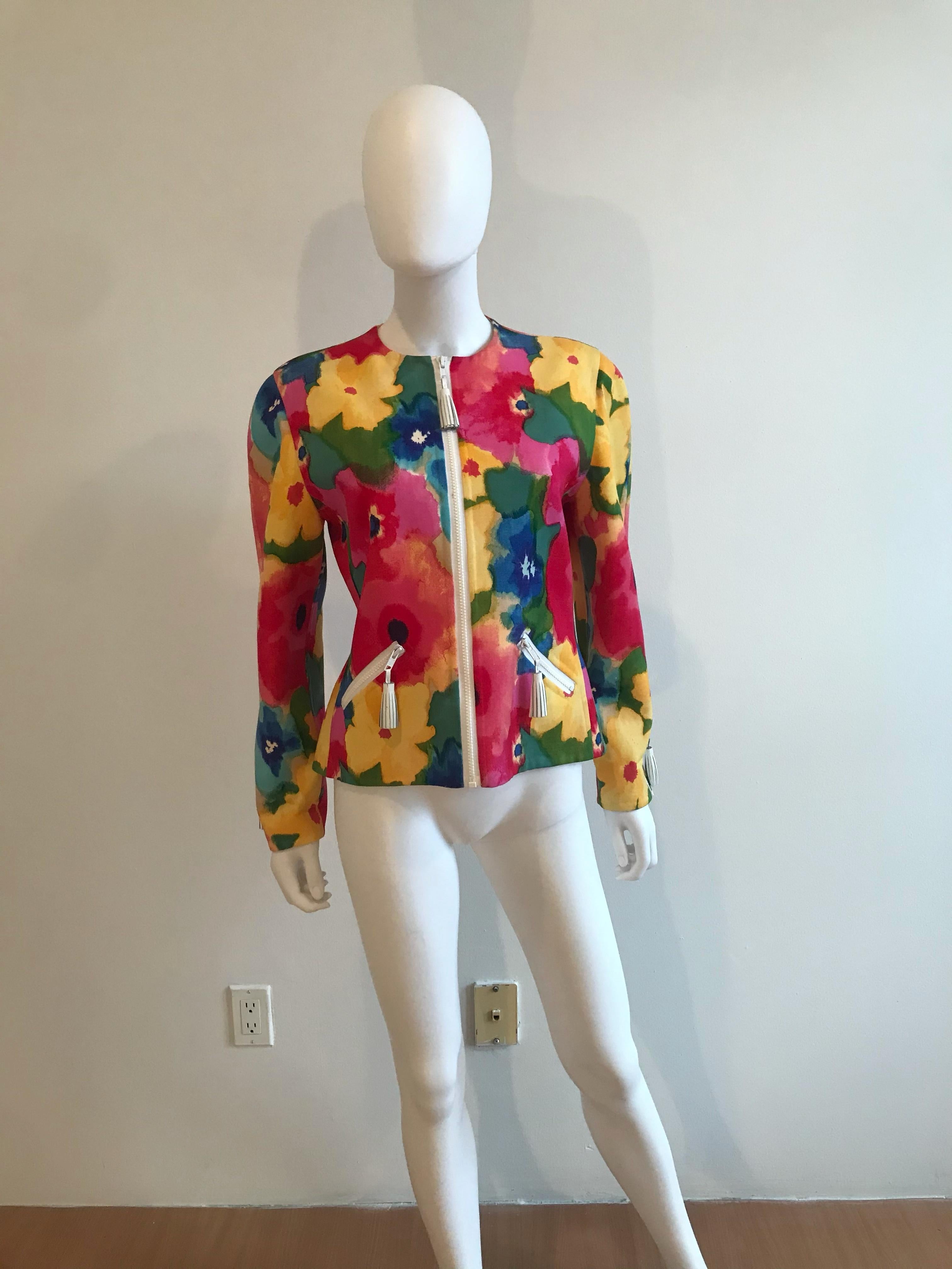 Bill Blass Vibrant watercolor floral printed jacket. 
Size Zippers with leather tassel detailed zippers. Size US 8. 
1990's Bill Blass label, Union made in the USA