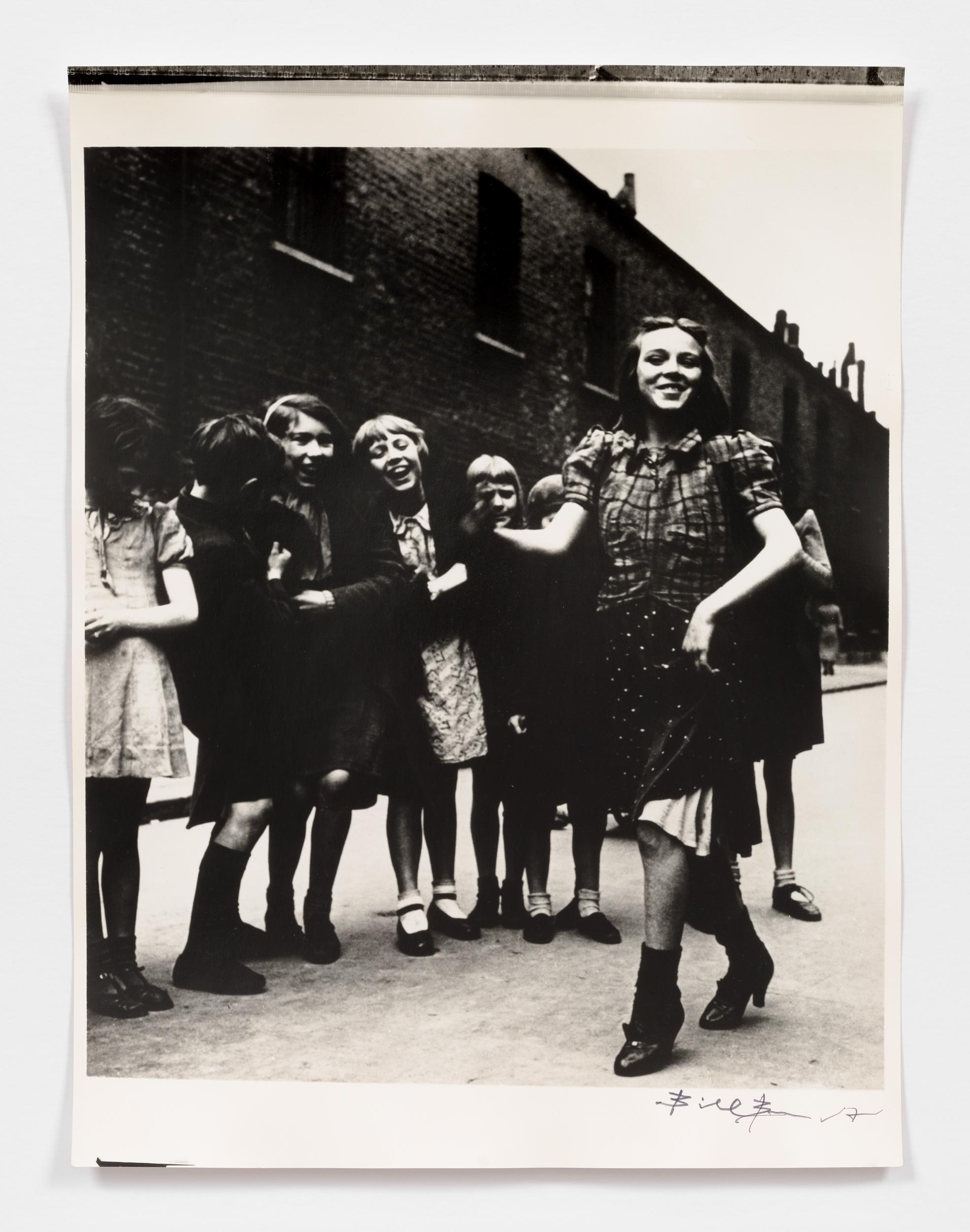 East End Girl dancing the Lambeth Walk - Photograph by Bill Brandt