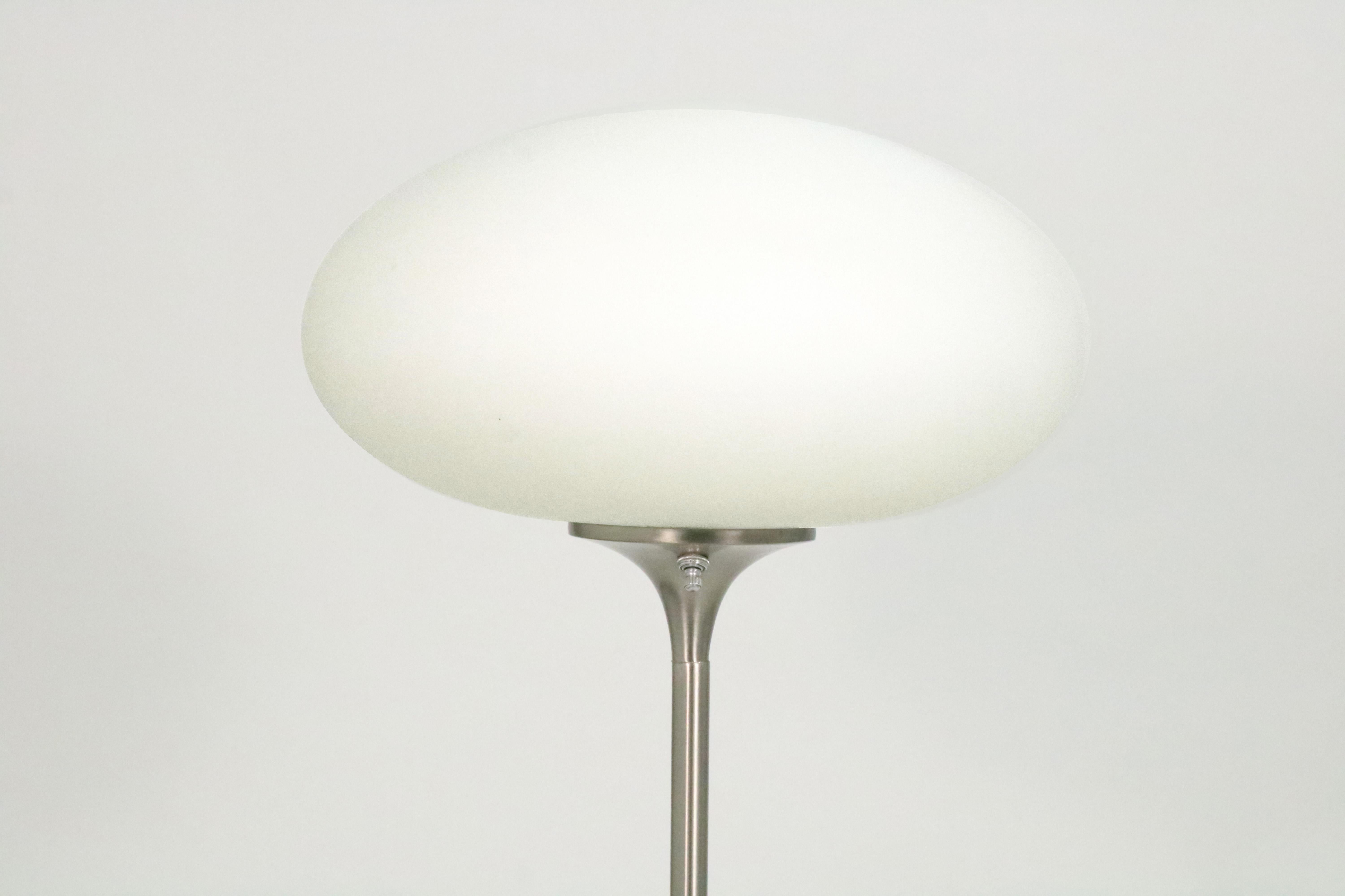 A vintage mushroom floor lamp by Bill Curry for Laurel Lamp Company.

Stainless still base with original Murano glass shade. Three-way switch.

Base diameter: 10 in.