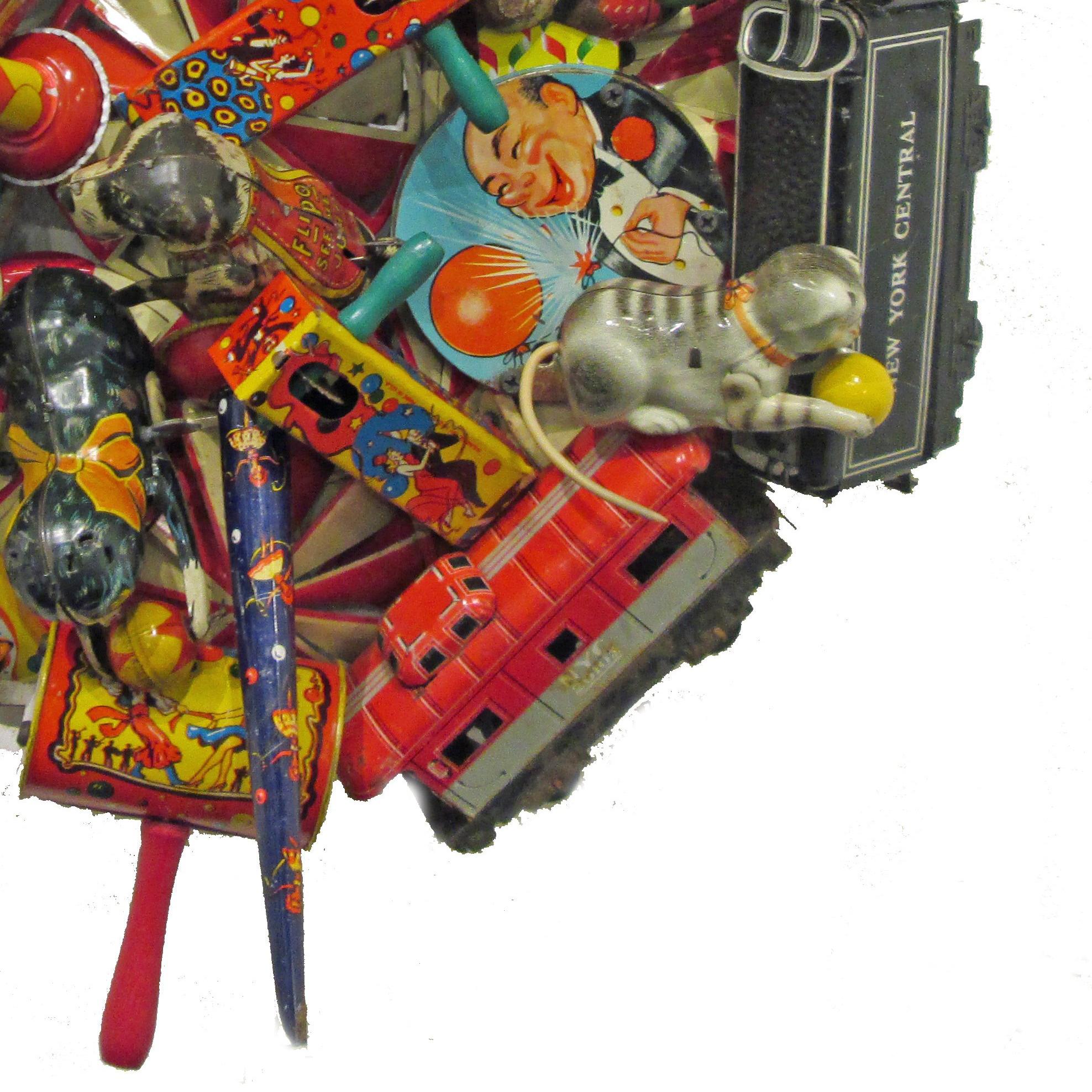American vintage  assemblage,  composed of vintage metal toys , 
planes ,train cars, caboose, telephones  . Signed by the artist.