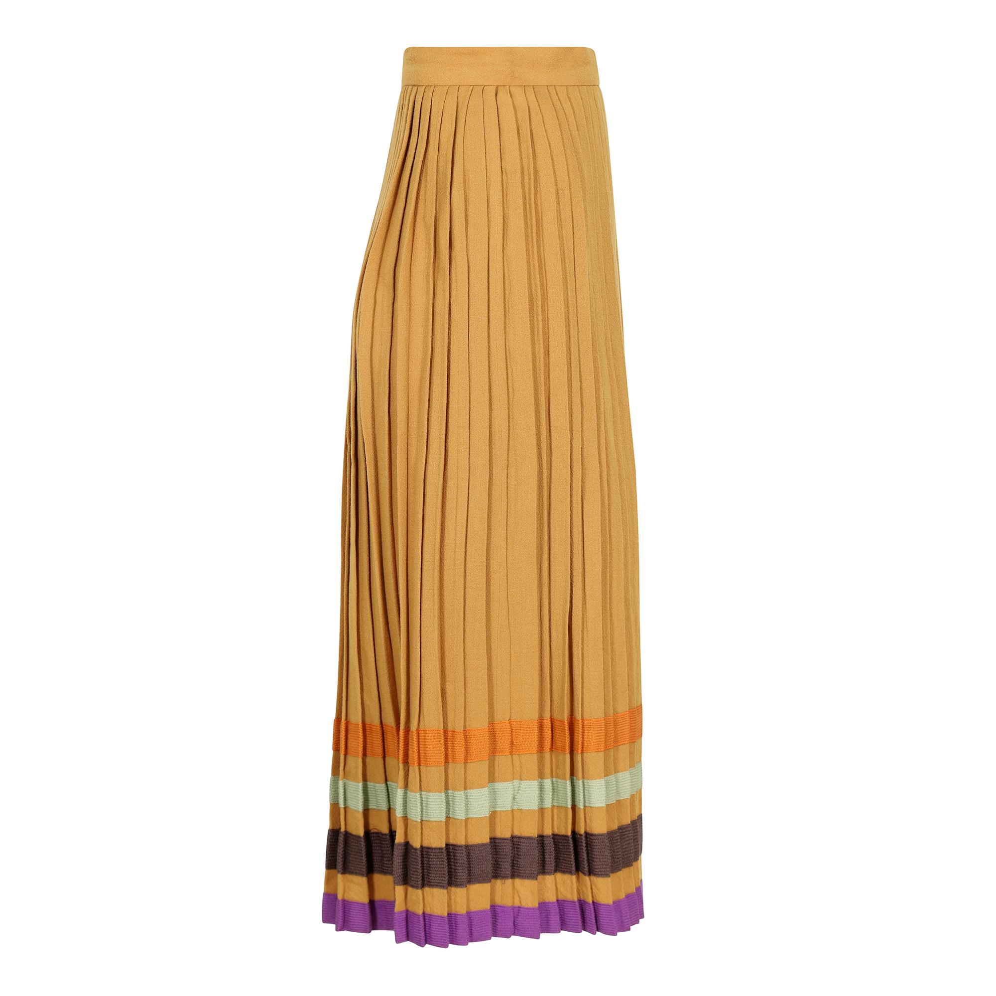 An extremely wearable late 1970s Bill Gibb mainline wool accordion pleat skirt.  This piece is in a rich warm tone of ochre adorned with four horizontal bands that form the lower section of the skirt in an array of contrasting colours - orange, lime