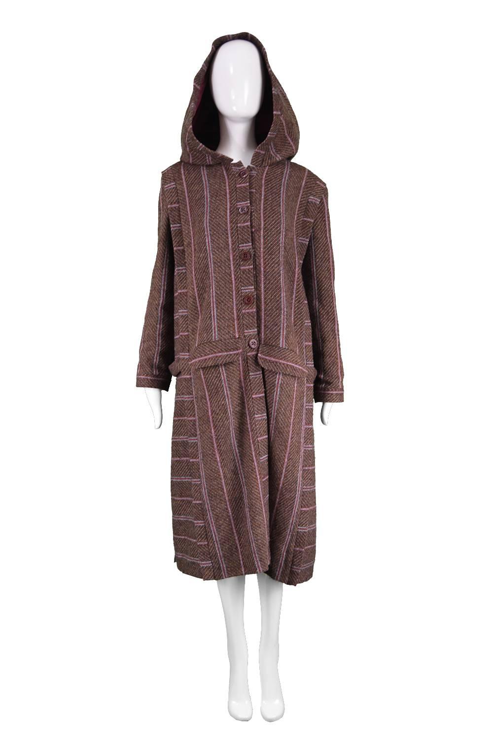 Bill Gibb Dramatic Brown Wool Striped Vintage Coat with Oversized Hood, 1970s

Estimated Size:  Small to Medium with a looser fit. Please check measurements.
Bust - up to 40” / 101cm (meant to be worn with a loose, oversized fit)
Waist - Free up to