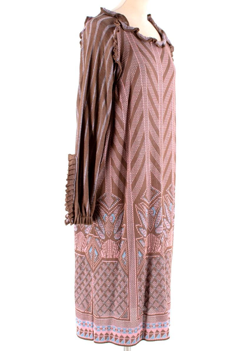 Bill Gibb for Annette Carol Patterned Knitted Dress 

- Multi-coloured striped/geometric pattern
- Frill detail edging 
- Long puffed sleeves 
- Maxi length 
- Loose fit 
- Slip pockets 

Materials:
- 100% Acrylic 

Hand Washable 

Made in England