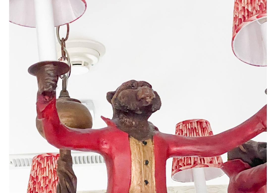 Bill Huebbe Designs Ten Light Chandelier In The Form Of Monkeys In Red Coats In Fair Condition For Sale In Bridgeport, CT