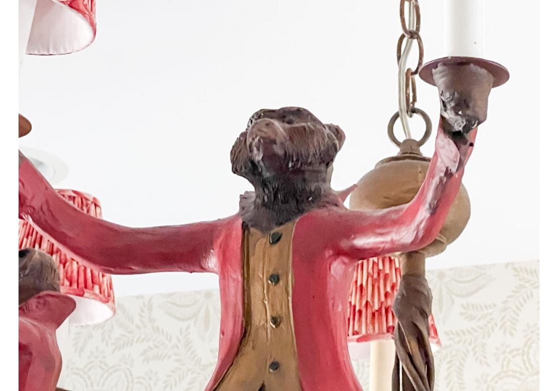 Contemporary Bill Huebbe Designs Ten Light Chandelier In The Form Of Monkeys In Red Coats For Sale
