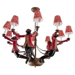 Bill Huebbe Designs Ten Light Chandelier In The Form Of Monkeys In Red Coats