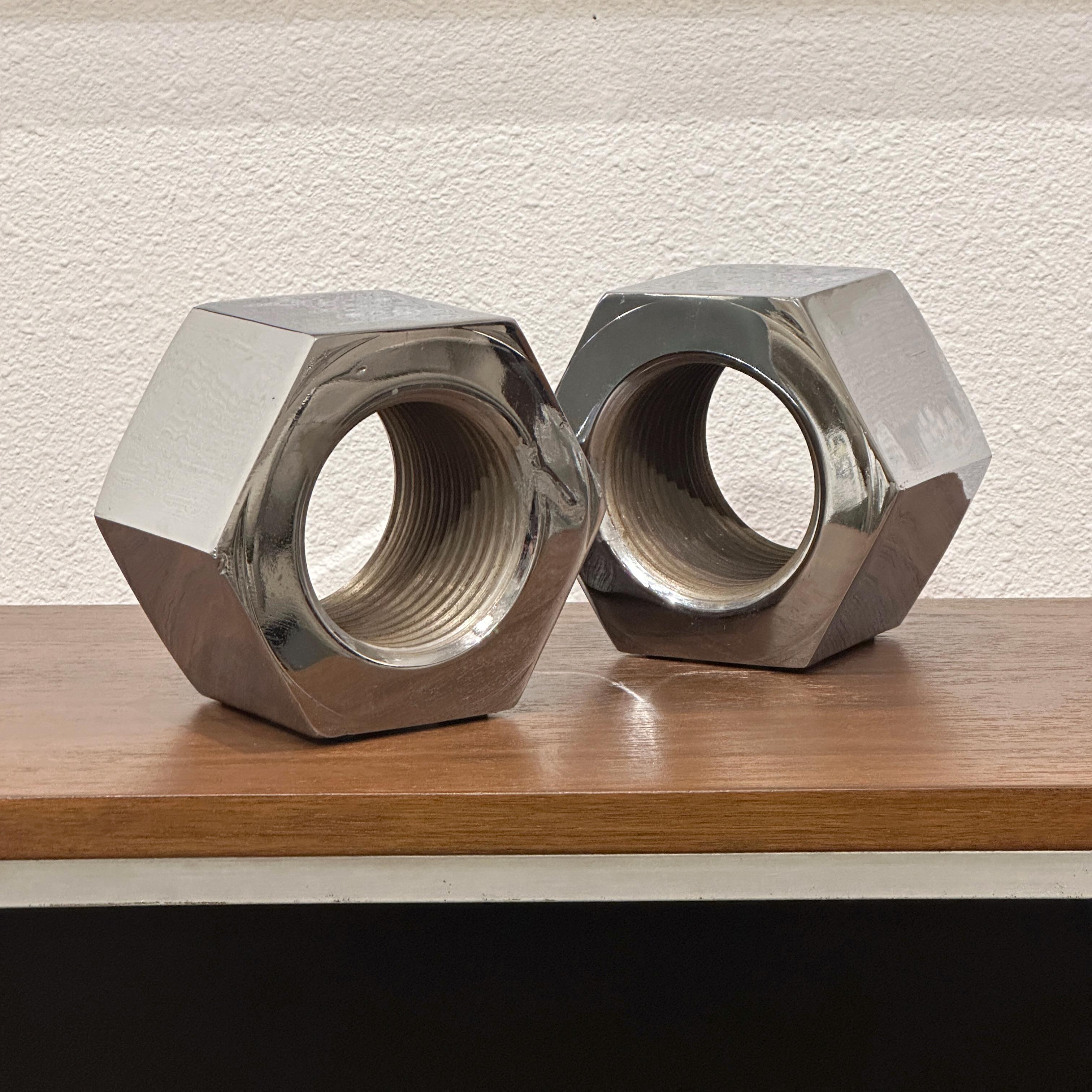 Bill + Jackie Curry for Design Line, USA Chrome Plated Cast Iron Bookends Model J-20, ca 1960s. A classic California design we have been told were actually designed by Bill's wife Jackie Curry. Original catalog excerpts included in the detailed