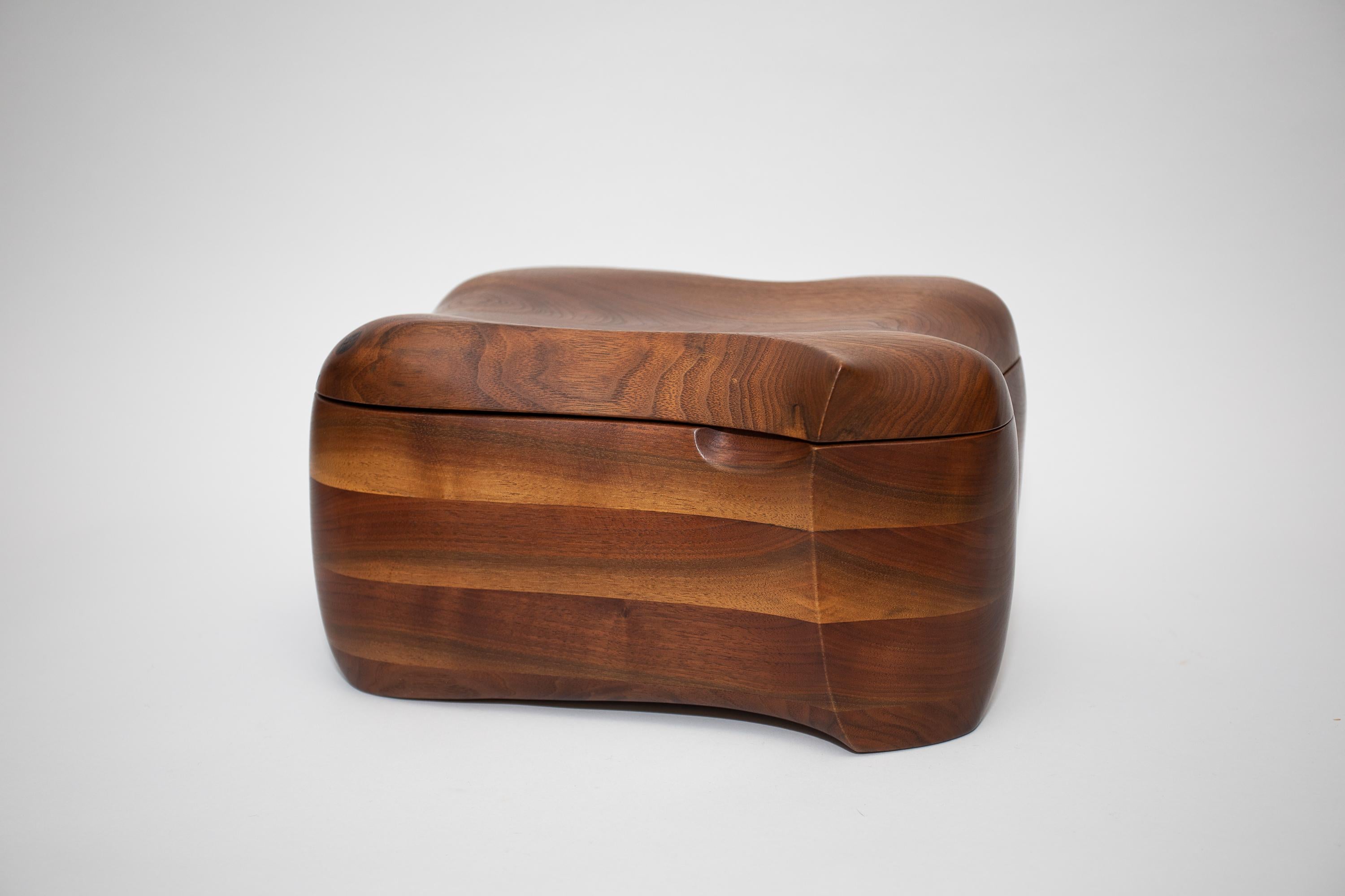 A great organic shaped  Box 
Integrated carved interior tray
Beautiful wood selection
A large organic example of American Craft
