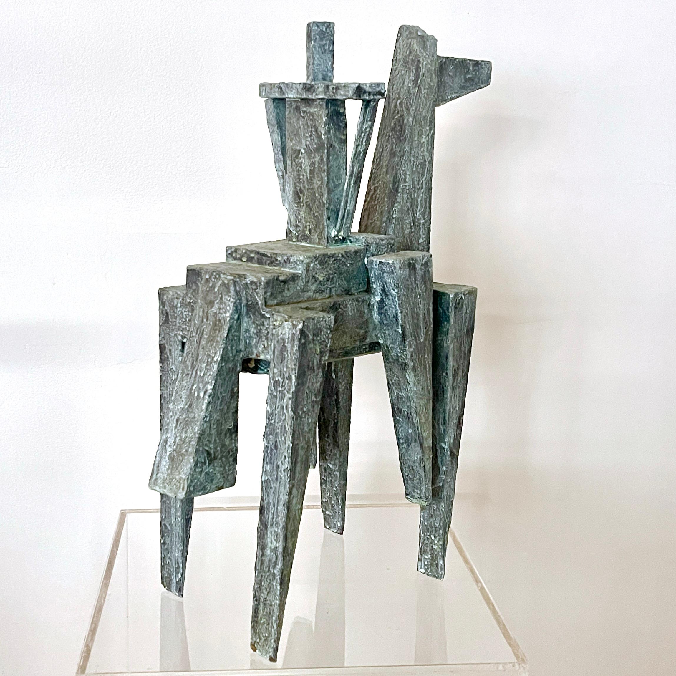 Cubist abstract mixed-media sculpture titled 'Horse and Rider' was created using various materials including wood, papier-mache, and paint by  Bill Low (Scotland 1898-1980). Beautiful weathered bronze verdigris effect surface.