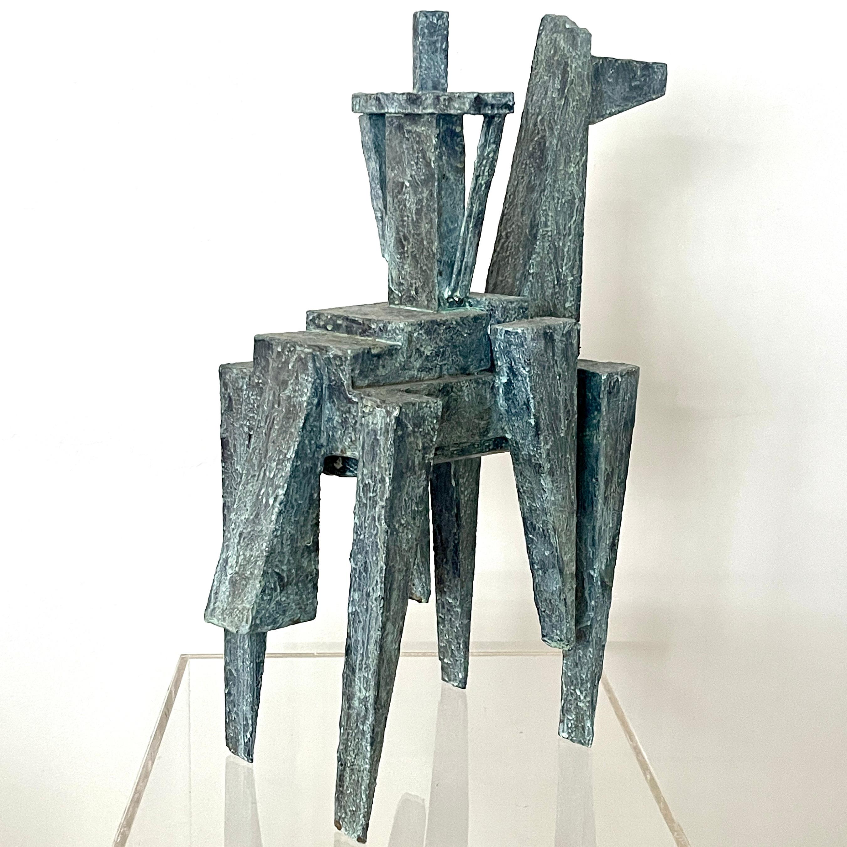 Cubist abstract mixed-media sculpture titled 'Horse and Rider' was created using various materials including wood, papier-mache, and paint by  Bill Low (Scotland 1898-1980). Beautiful weathered bronze verdigris effect surface.