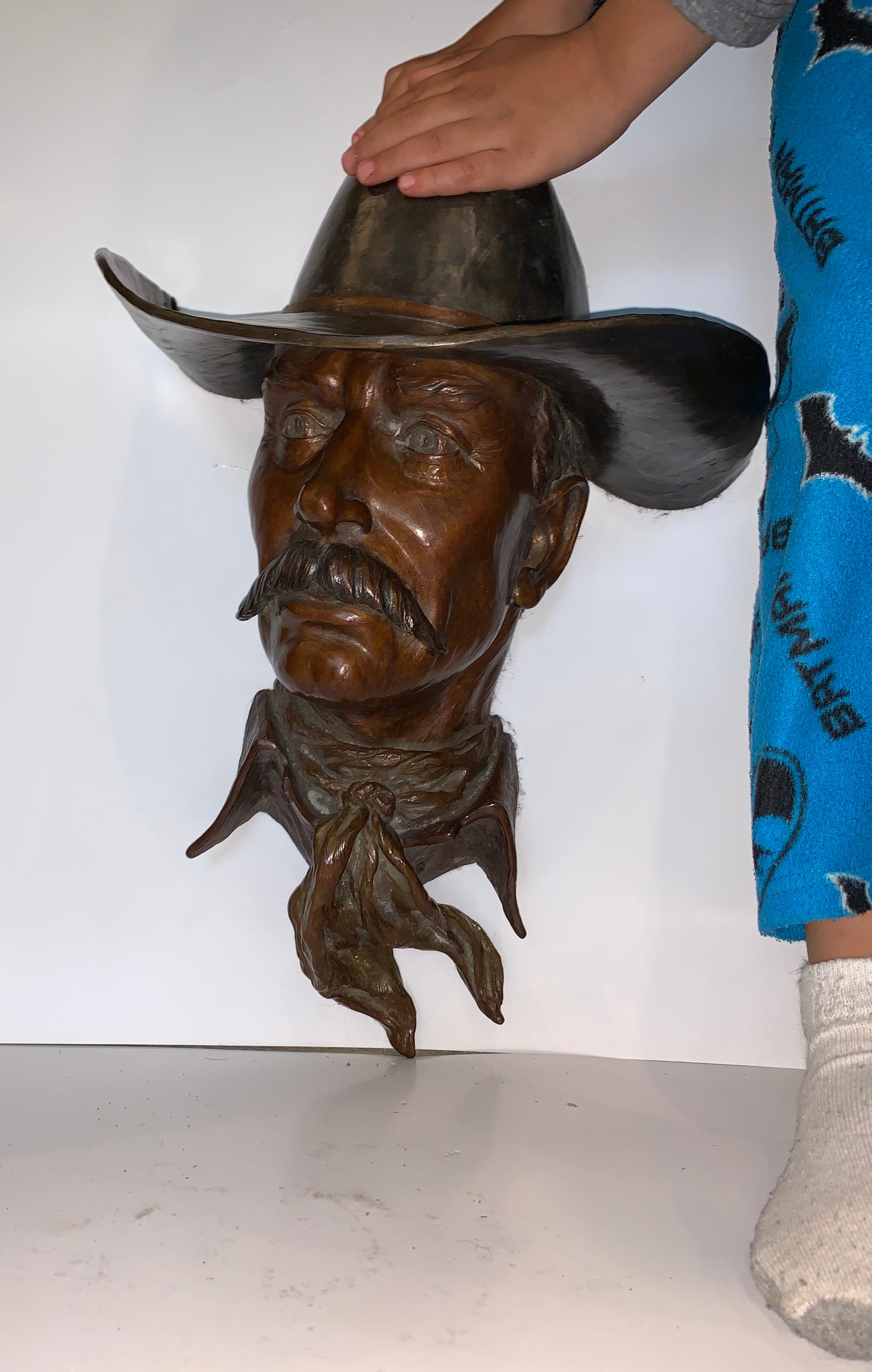 Bill Nebeker (Born 1942) is a prolific Artist from Idaho Living in Arizona. The bronze up for sale is a gorgeous finely casted American Bronze of a Cowboy.  This wall mount for sure is a fine example!  

Edition number 13/25 
Overall Measurements