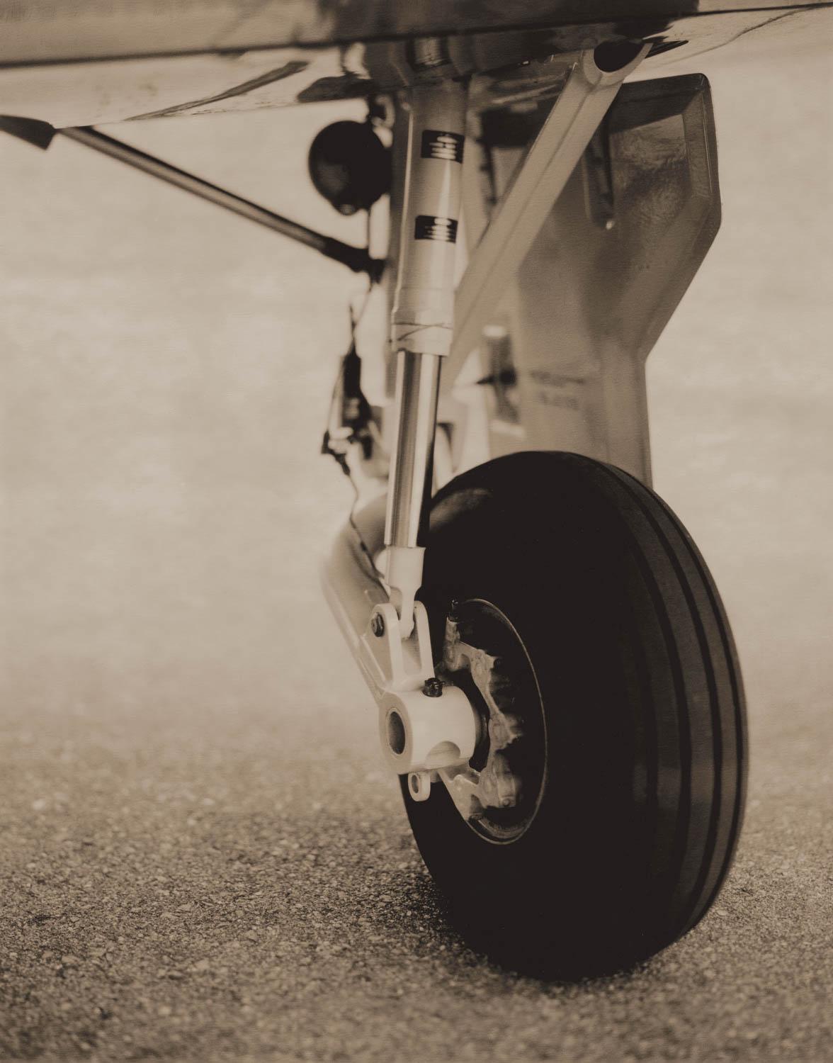 Bill Phelps Still-Life Photograph - Airplane, Wheel