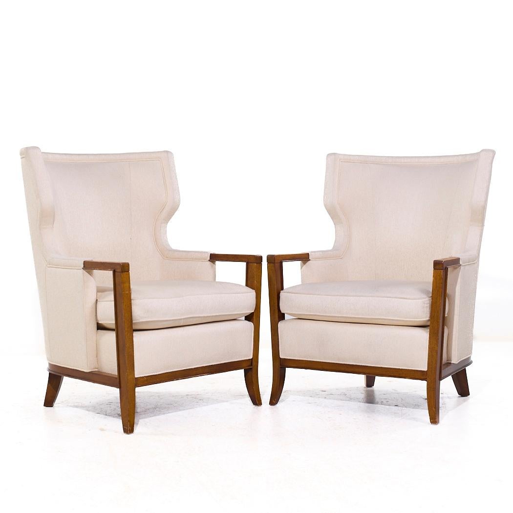 Bill Sofield for Baker Manor Wing Lounge Chairs - Pair

Each lounge chair measures: 31.25 wide x 35 deep x 41 high, with a seat height of 20 and arm height/chair clearance 24.5 inches

We take our photos in a controlled lighting studio to show as
