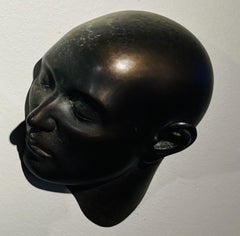 "Faces (1/1)" (2023), Bronze Wall Installation by Bill Starke