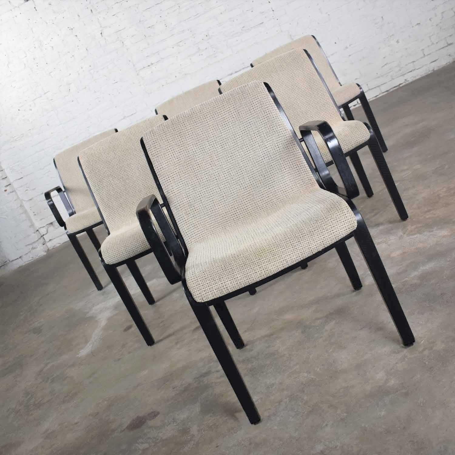 Handsome set of 6 Mid-Century Modern 1300 Series dining chairs designed by Bill Stephens in 1967 for Knoll International. This set includes 2 armchairs and 4 side chairs and has a black bentwood frame and white with black tweed original upholstery.