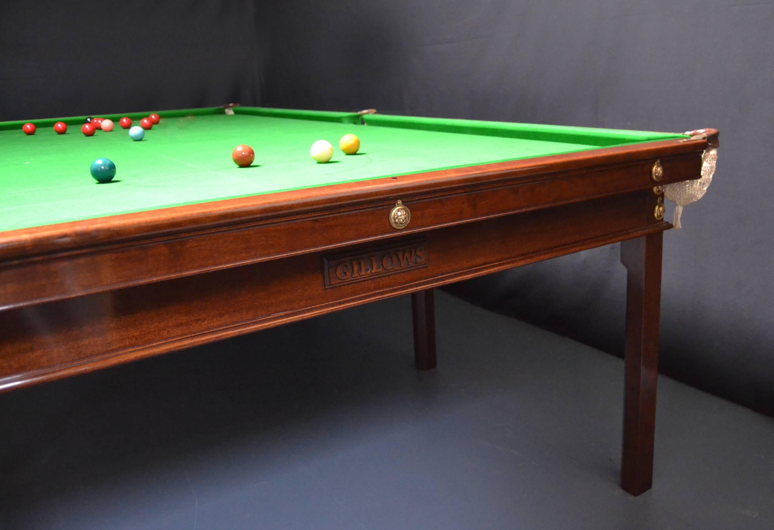 A rare 10ft x 5ft Billiard or Snooker table in the Gainsborough manner by Gillow's of Lancaster circa 1800, standing on eight elegant chamfered and shaped legs, with brass mounts fitted to the frame, legs and cushion friezes.
The simple but