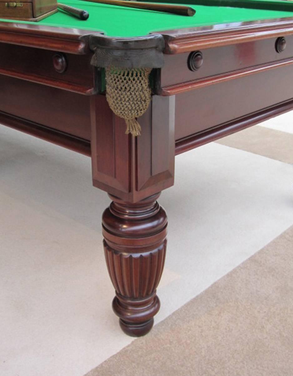 A mahogany 10ft x 5ft three-quarter sized billiard, snooker or pool table by George Wright of London circa 1890, this table stands on six elegant turned and reeded legs made of really good dense grained mahogany with applied bosses to the cushion