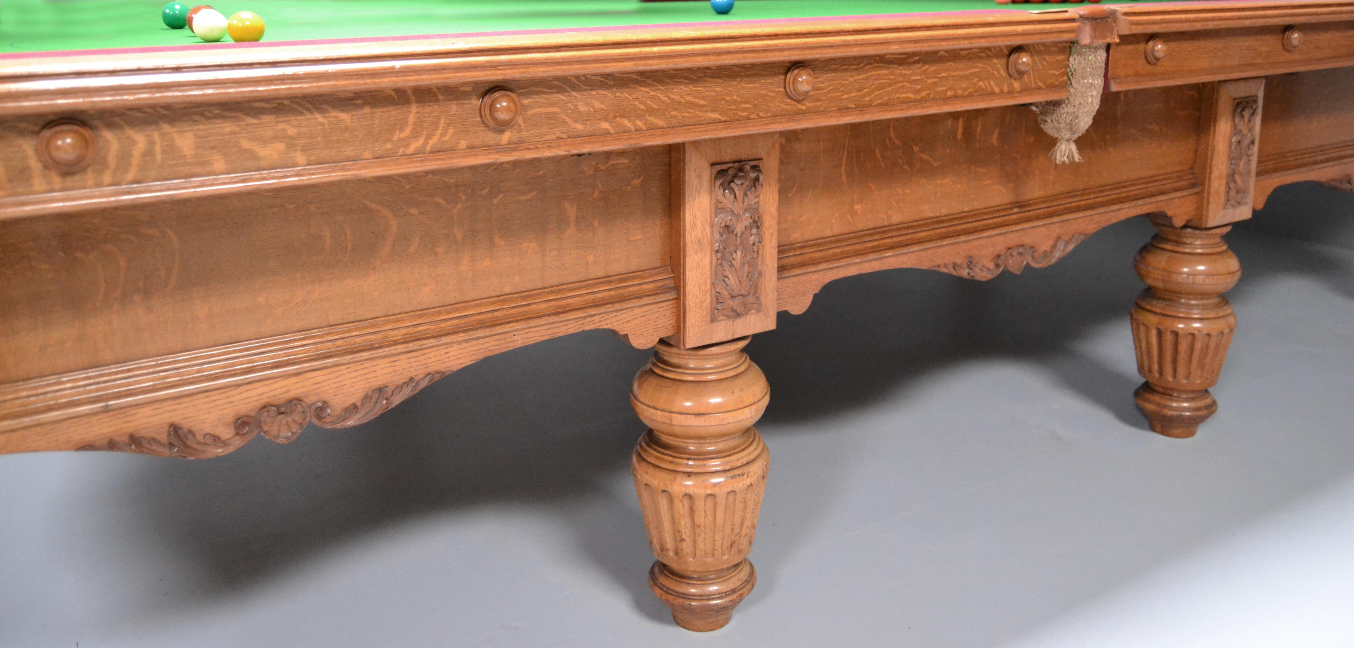 This is a great example of an English country house full size billiard or snooker table made circa 1890 by the renowned London manufacturer George Wright. 

Standing on eight sturdy reeded legs with attractive rectangular panels and decorative
