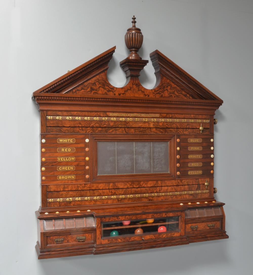 A spectacular wall mounted antique billiard snooker life pool burr walnut scoring cabinet circa 1880.

This is the best scoring cabinet we have ever seen

Featuring a decorative carved pediment, a central reversible mirror panel flanked by Life