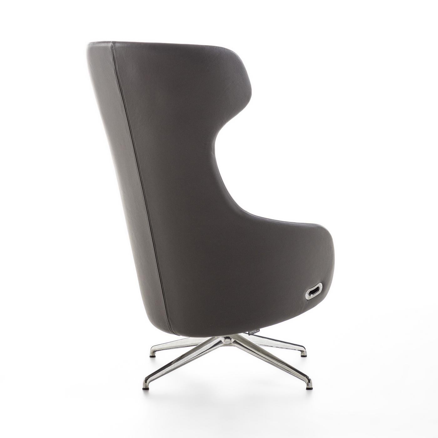 Swivel relax armchair with synchro mechanism. Internal metal frame, polyurethane foam padding, integrated headrest, and seat cushion, covered in leather, faux leather, or felt. 4-spoke base in polished chrome or painted. Swivel and tilt mechanism.