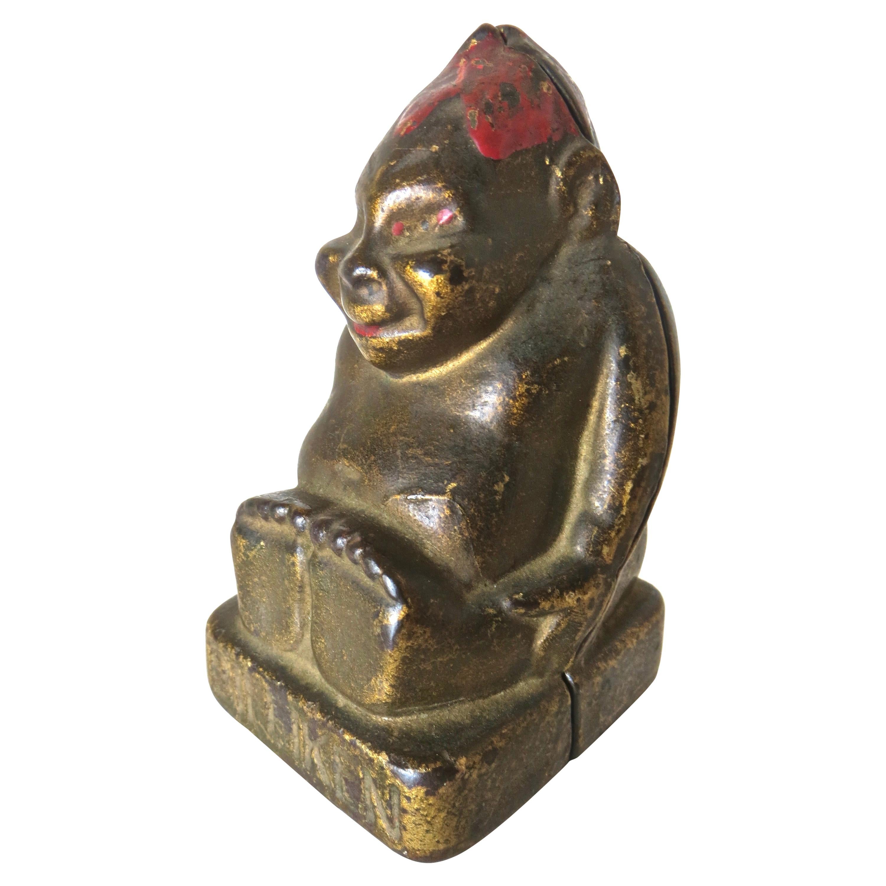 How can I tell if a cast iron bank is real or a reproduction?