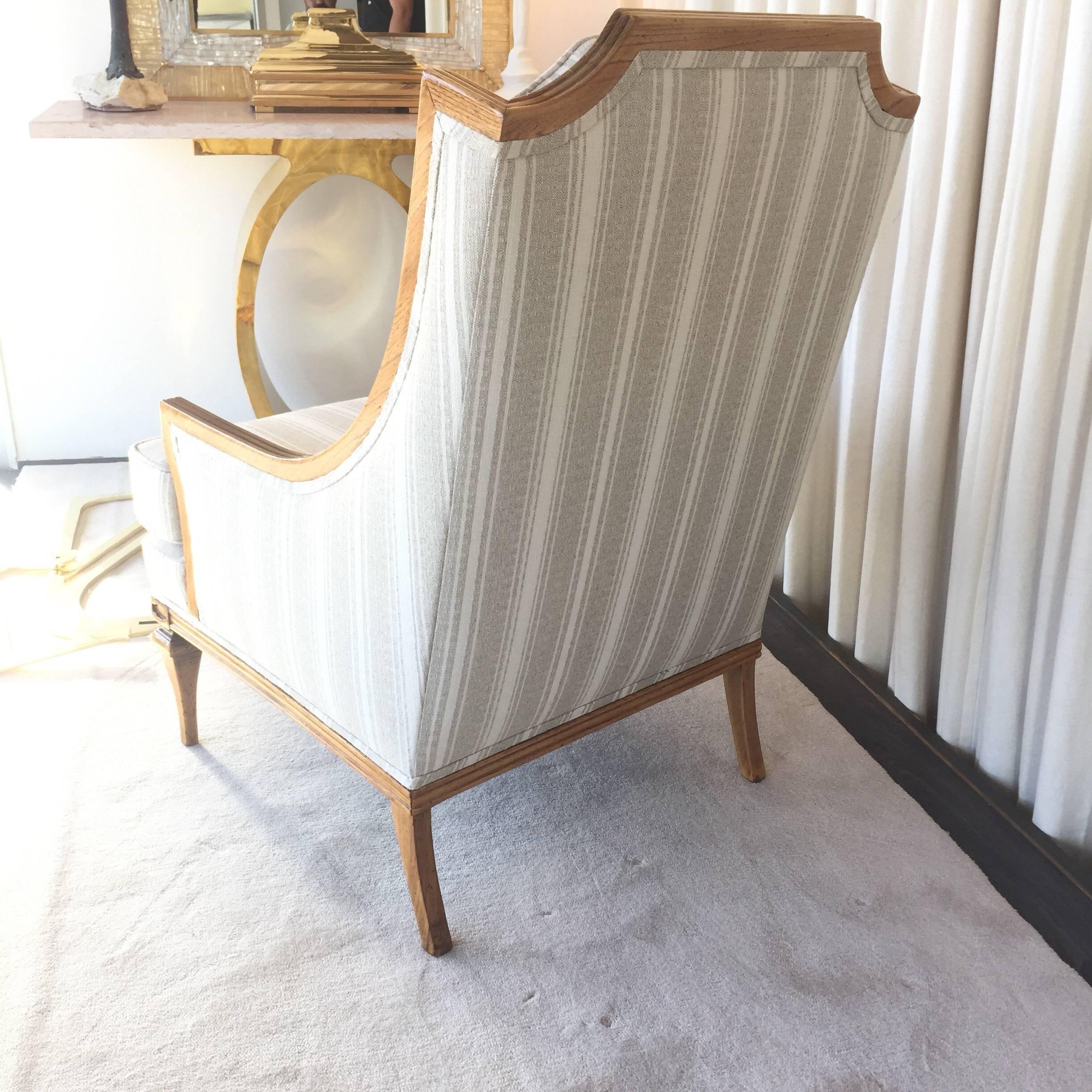 Stripped wood frame showing the natural wood, high gloss lacquer applied to accentuate the beauty and details of these chairs. Exceptionally upholstered in a striped natural Belgian heavy linen.